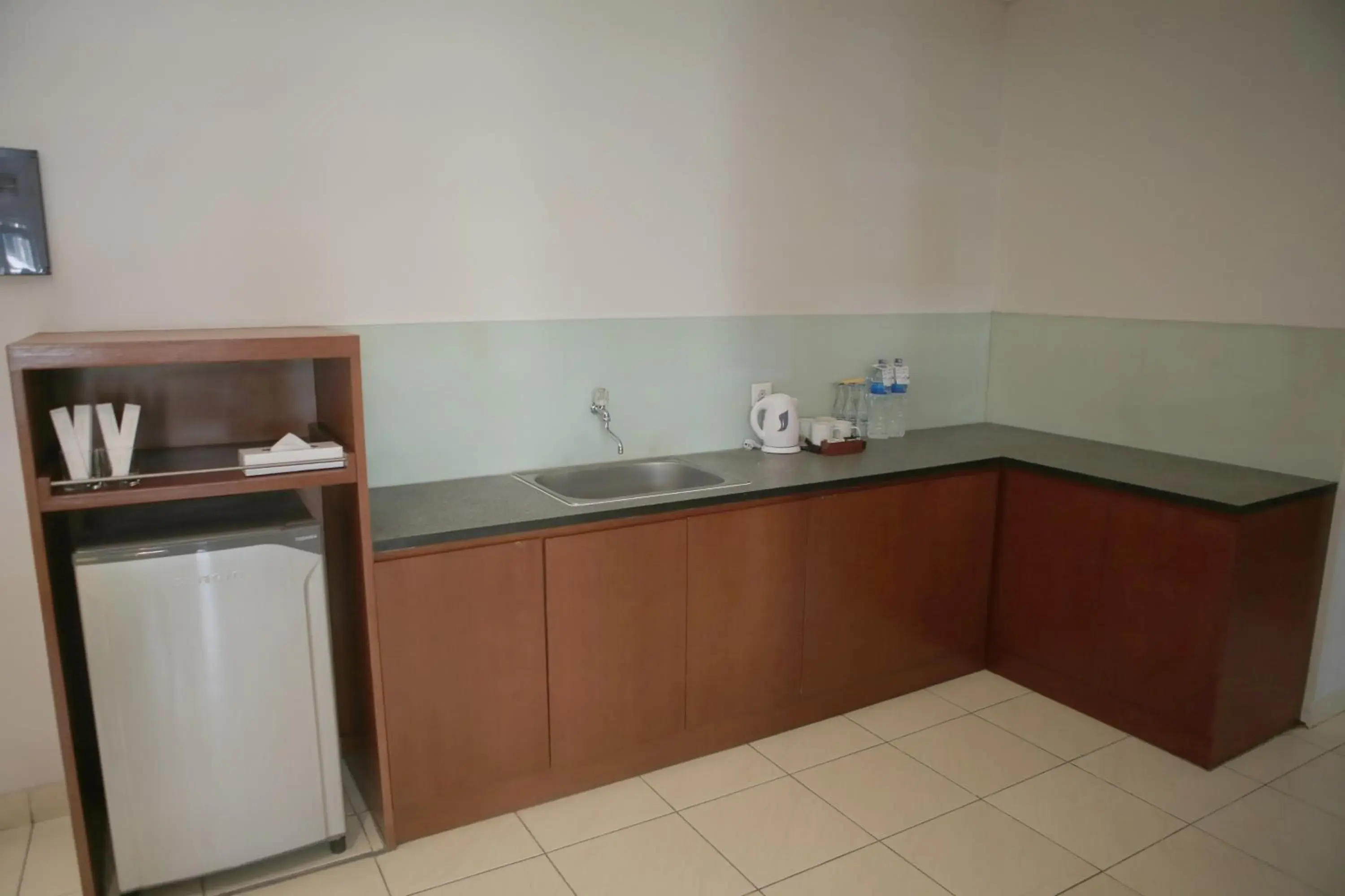 Property building, Kitchen/Kitchenette in Grand Kuta Hotel And Residence