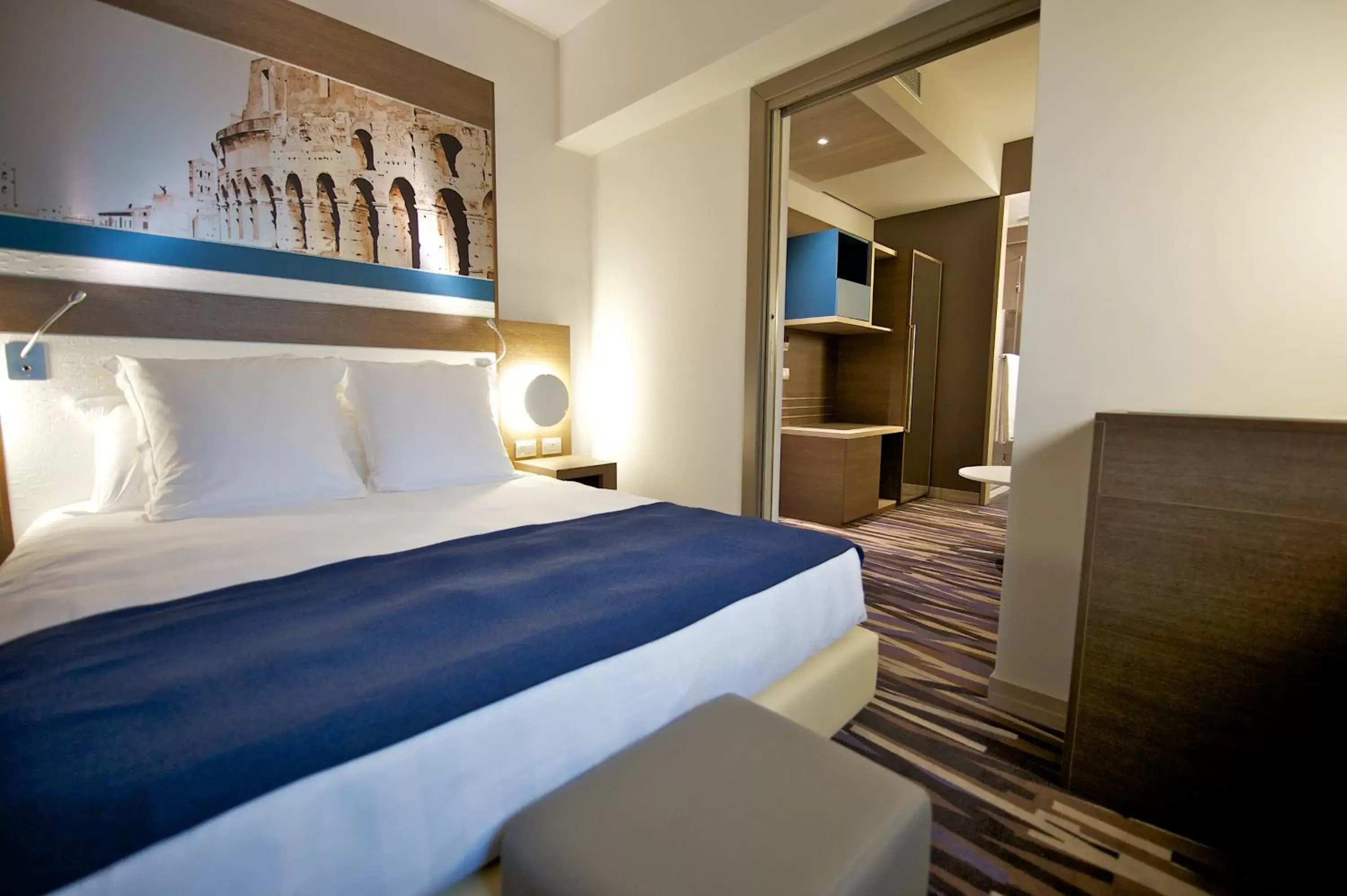 Bed in Mercure Roma Centro Colosseo