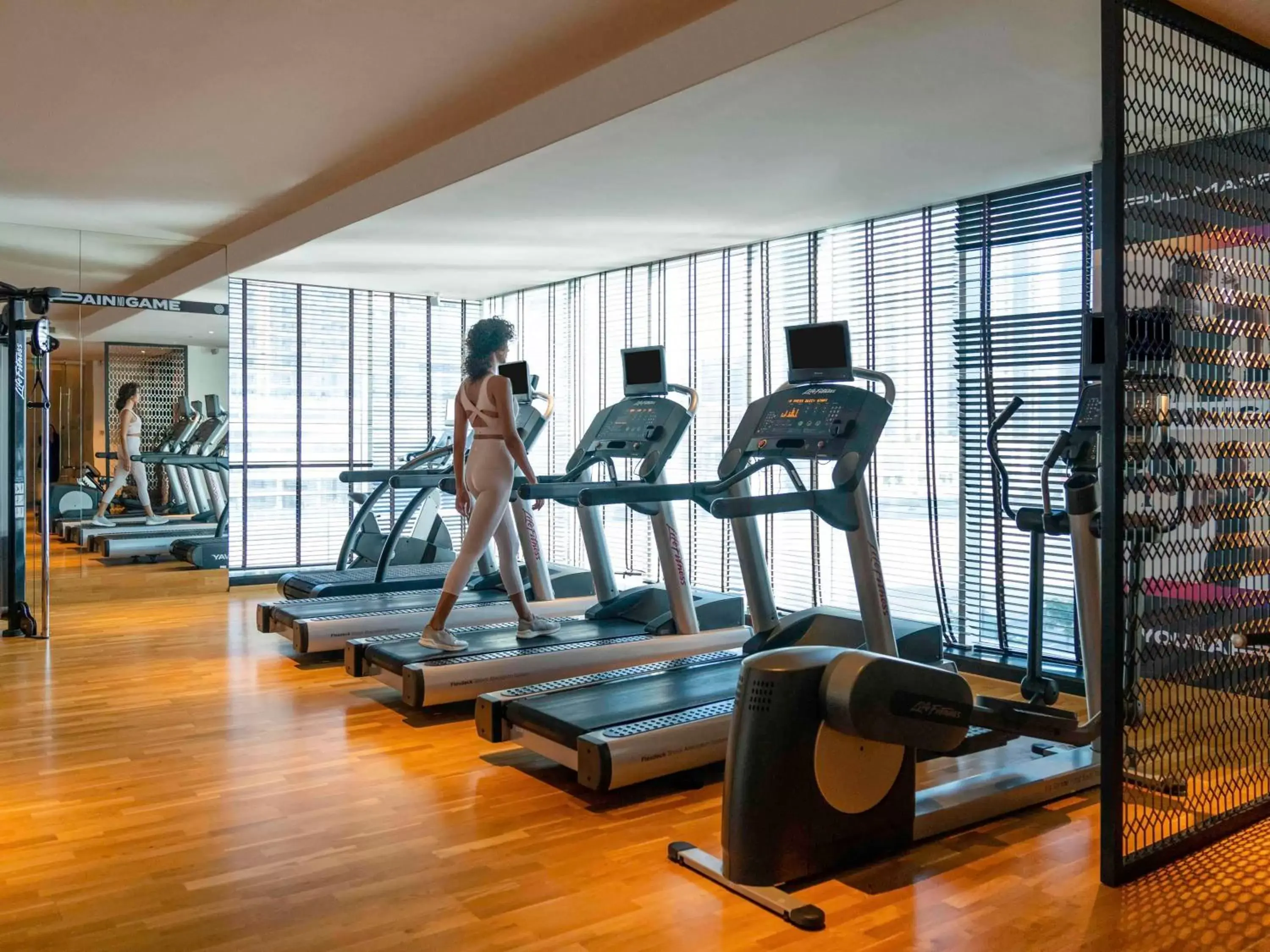 Bedroom, Fitness Center/Facilities in Pullman Dubai Downtown