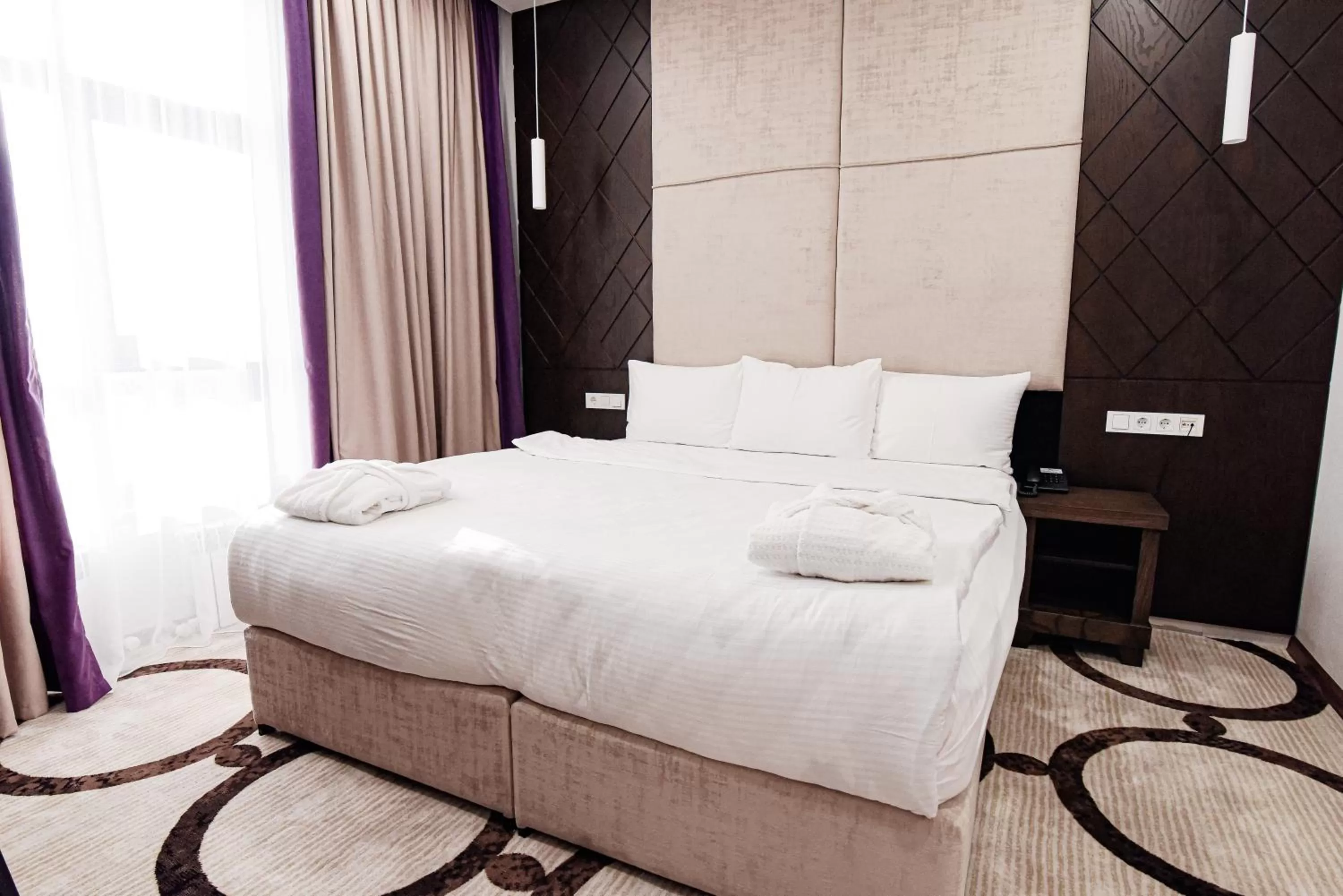 Bed in East Palace Hotel