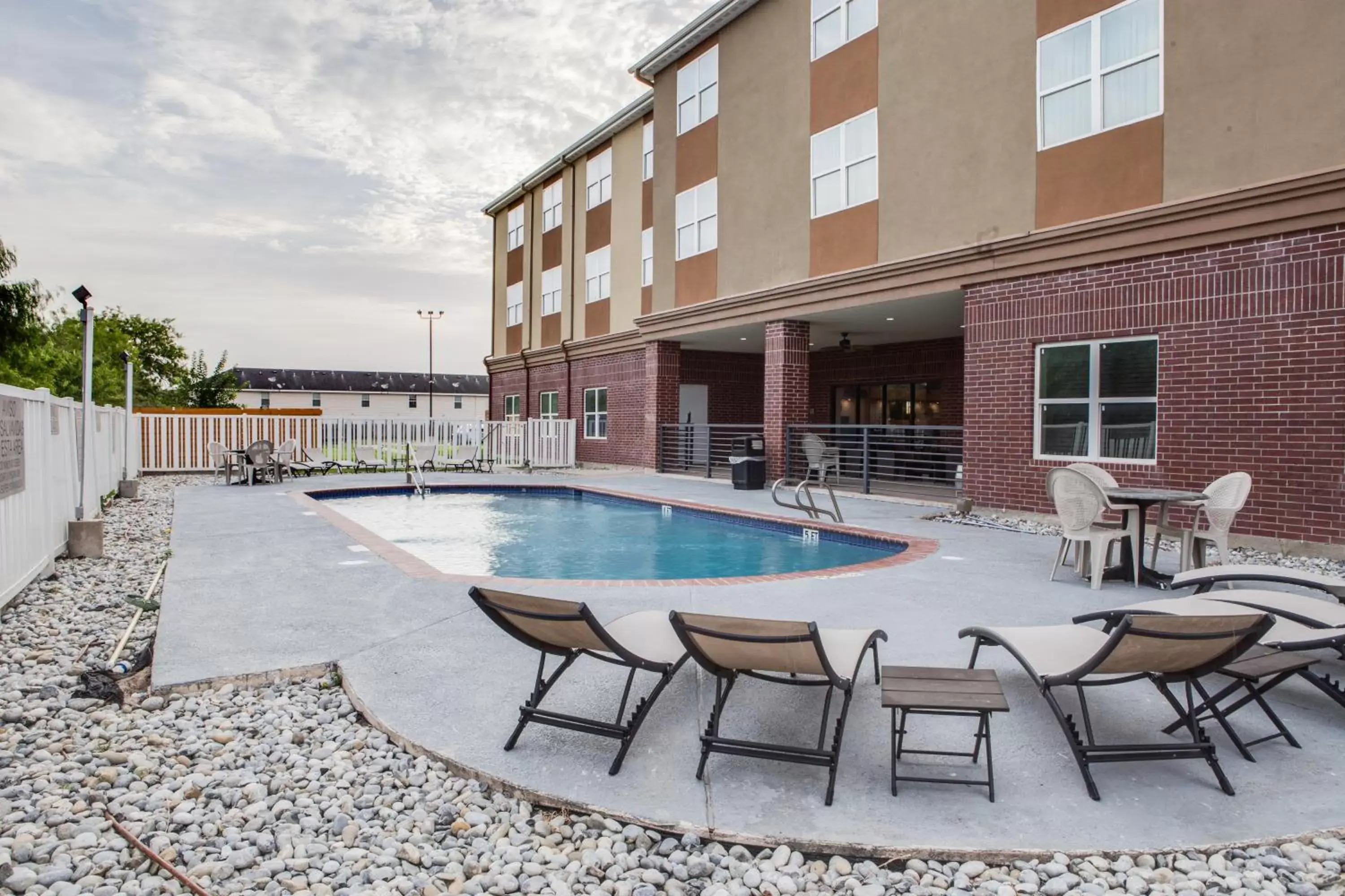 Balcony/Terrace, Swimming Pool in Country Inn & Suites by Radisson, Harlingen, TX