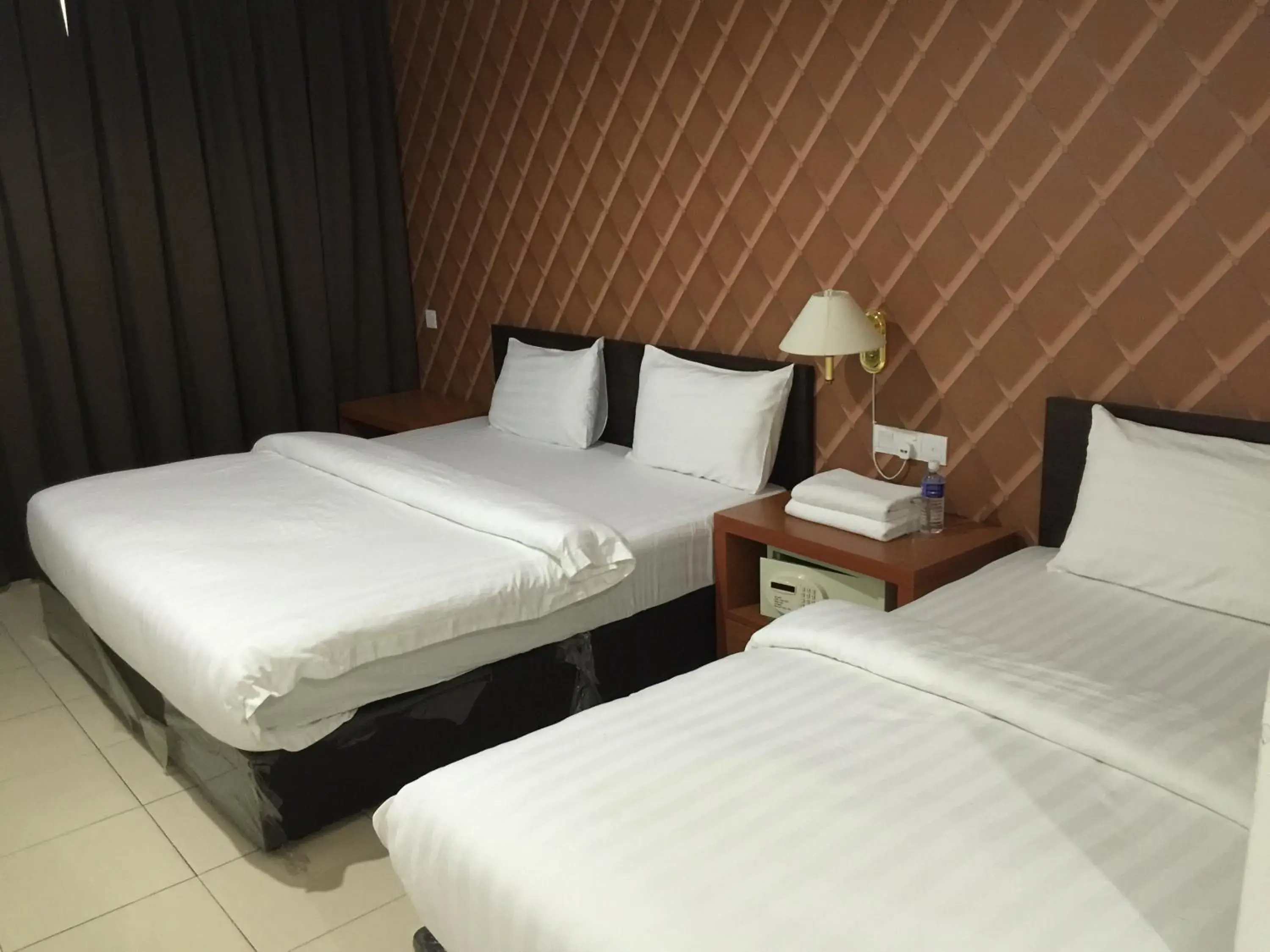 Bed in Permai Hotel