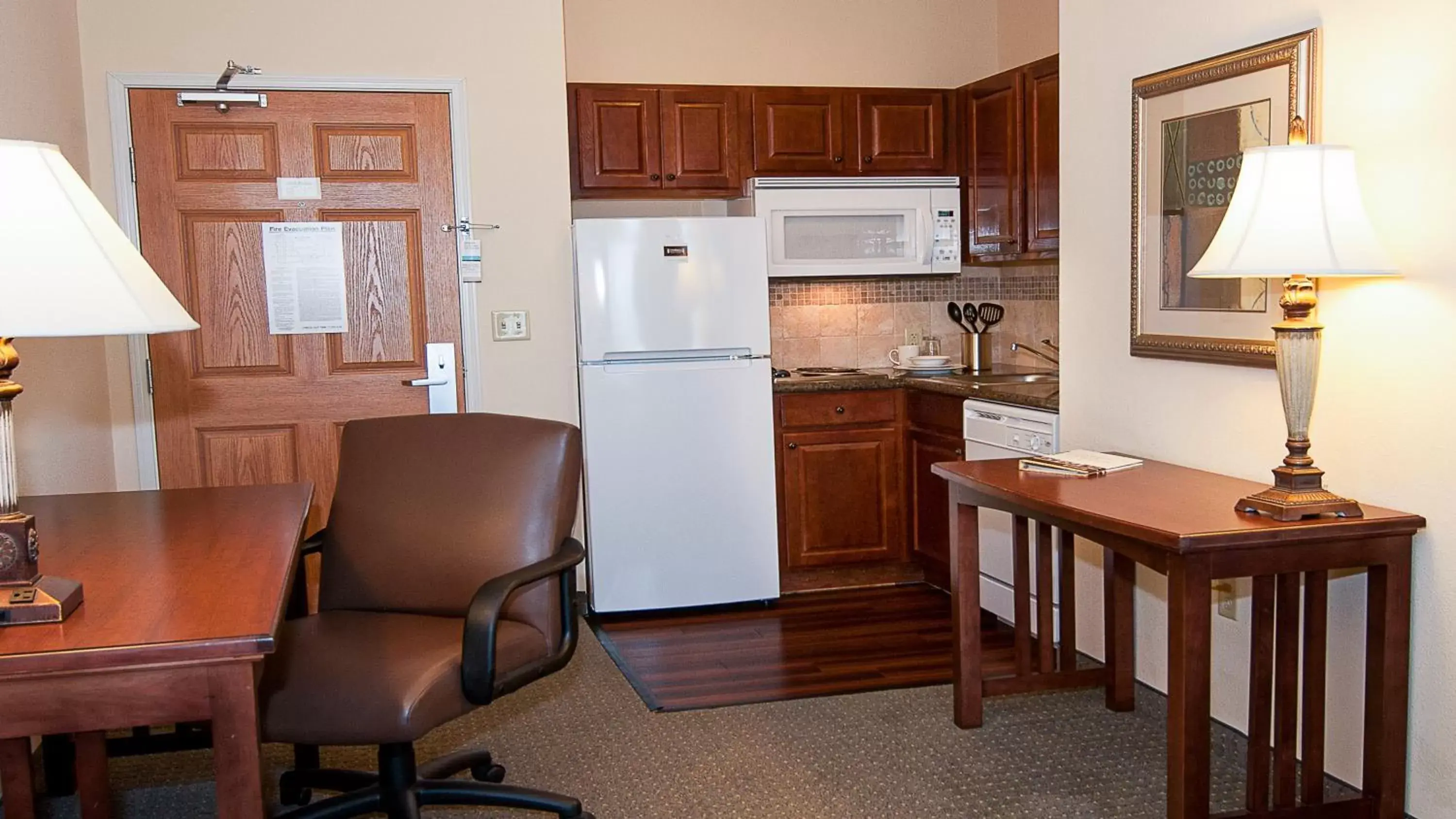 Photo of the whole room, Kitchen/Kitchenette in Staybridge Suites Wichita, an IHG Hotel