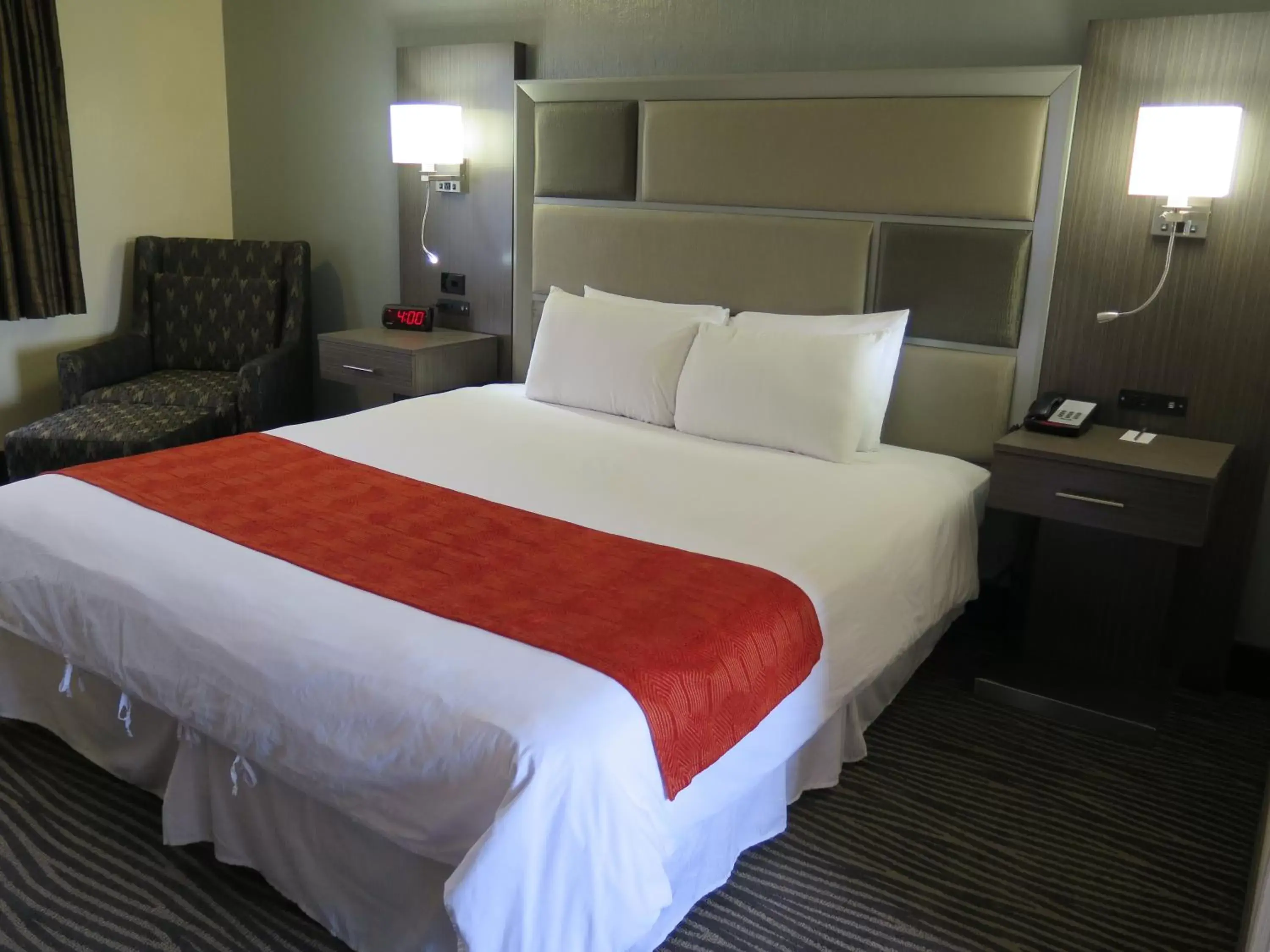 Decorative detail, Bed in Bonanza Inn and Suites