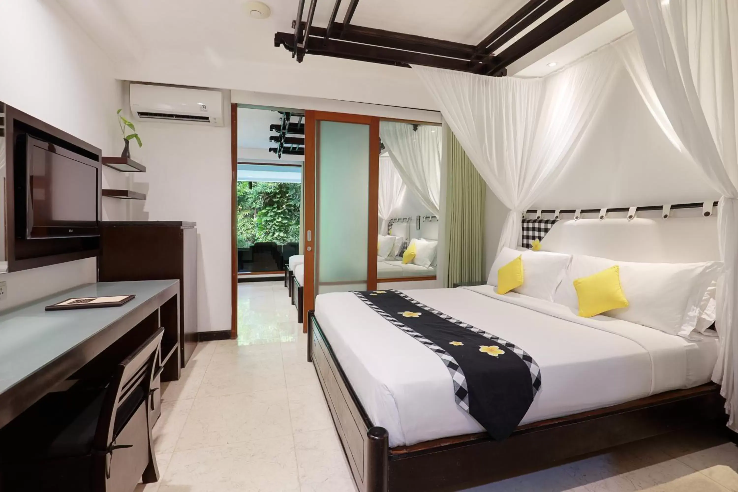 Bed in Legian Beach Hotel