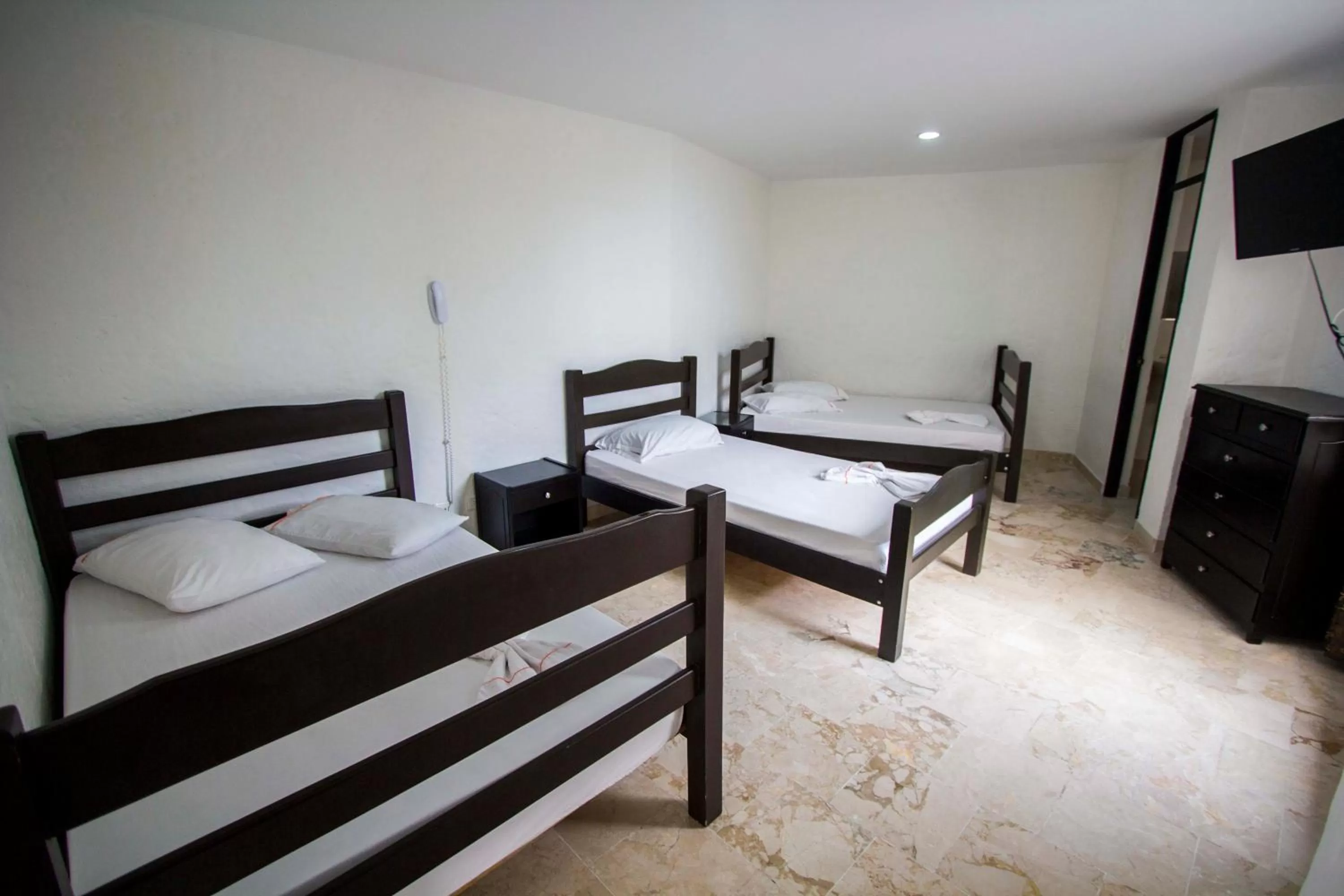 Bed in Blue Star Hotel