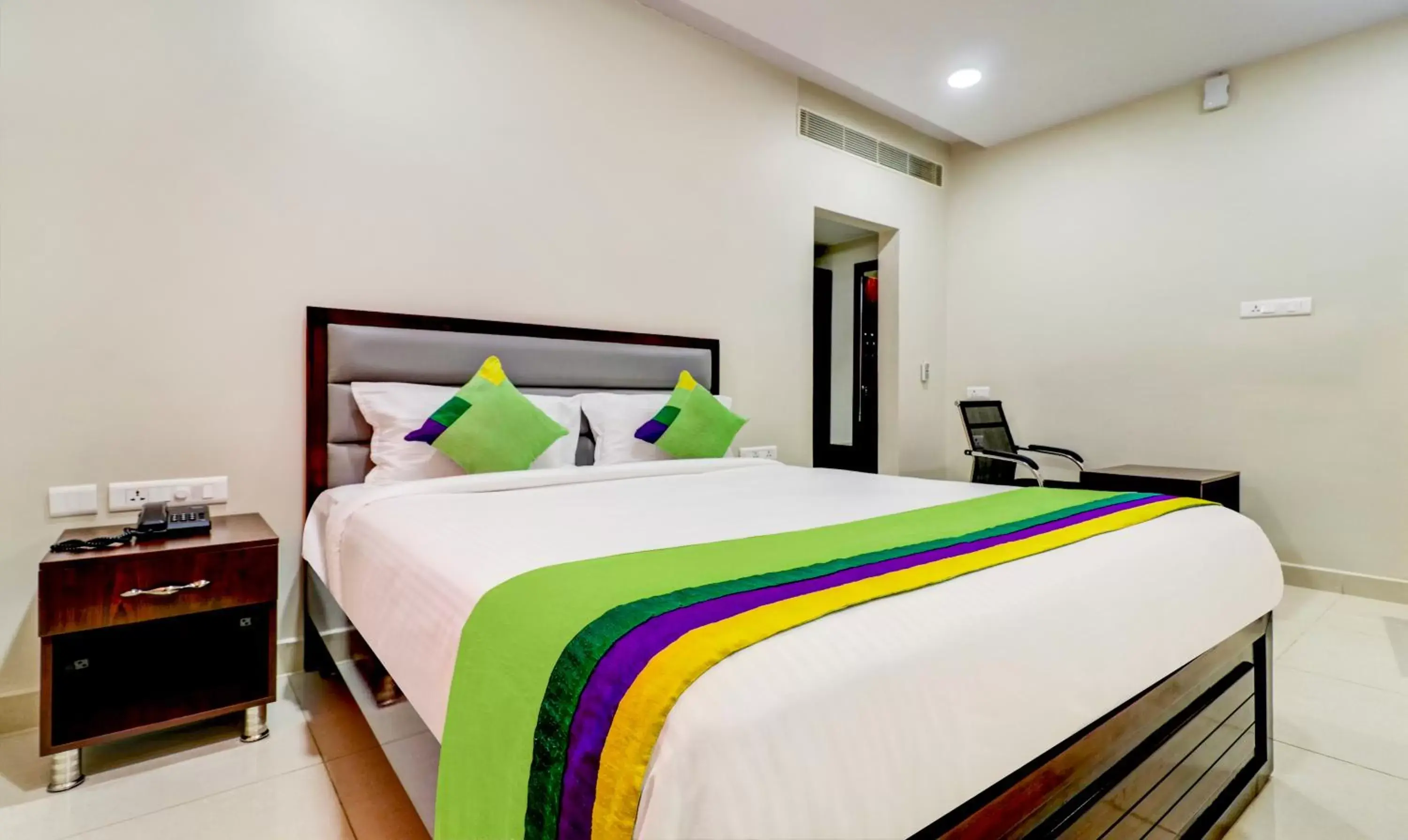 Bedroom, Bed in Treebo Grand Milan Bedroom, Bed in Treebo Grand Milan