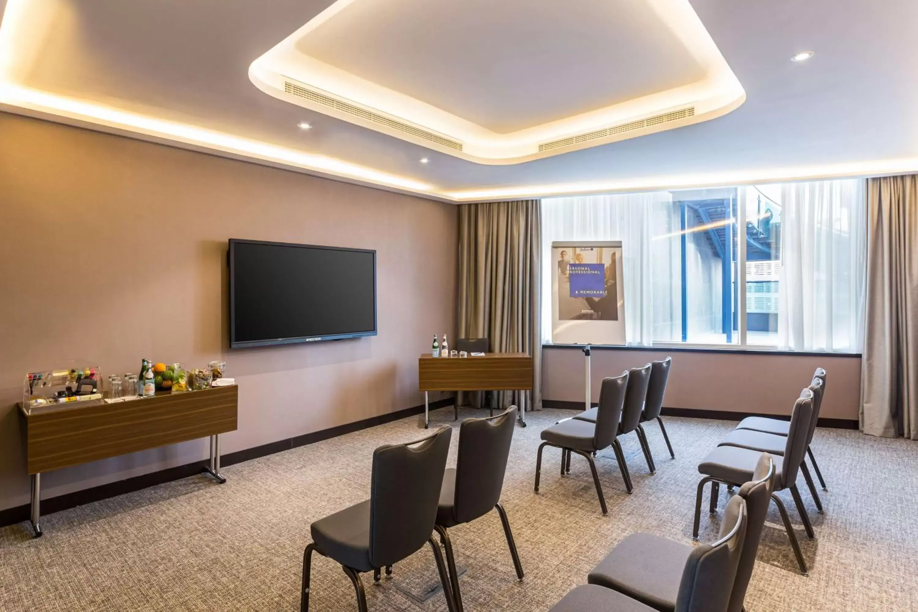 Business facilities, TV/Entertainment Center in Radisson Blu Hotel, Dubai Canal View