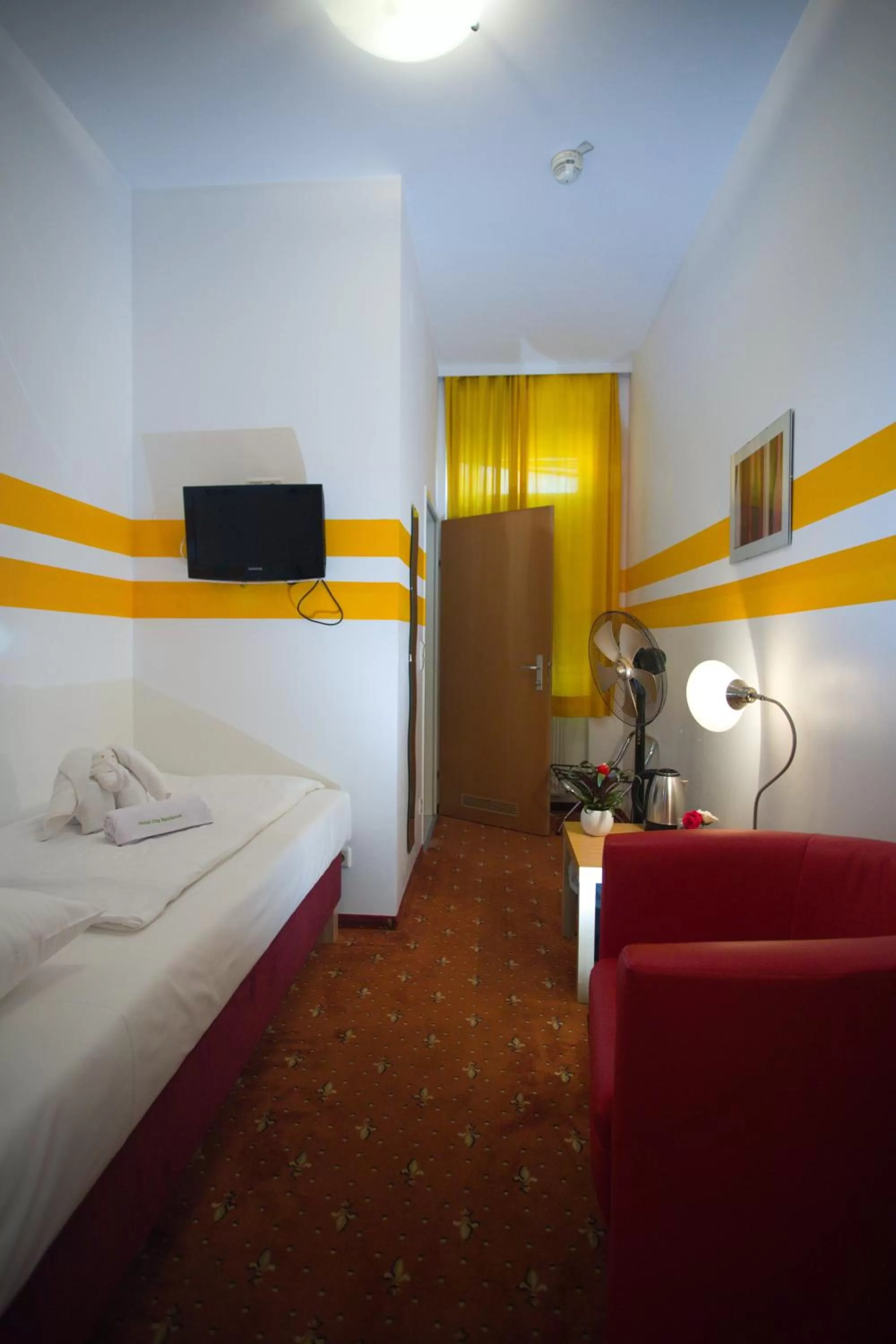 Bed in Hotel City Residence