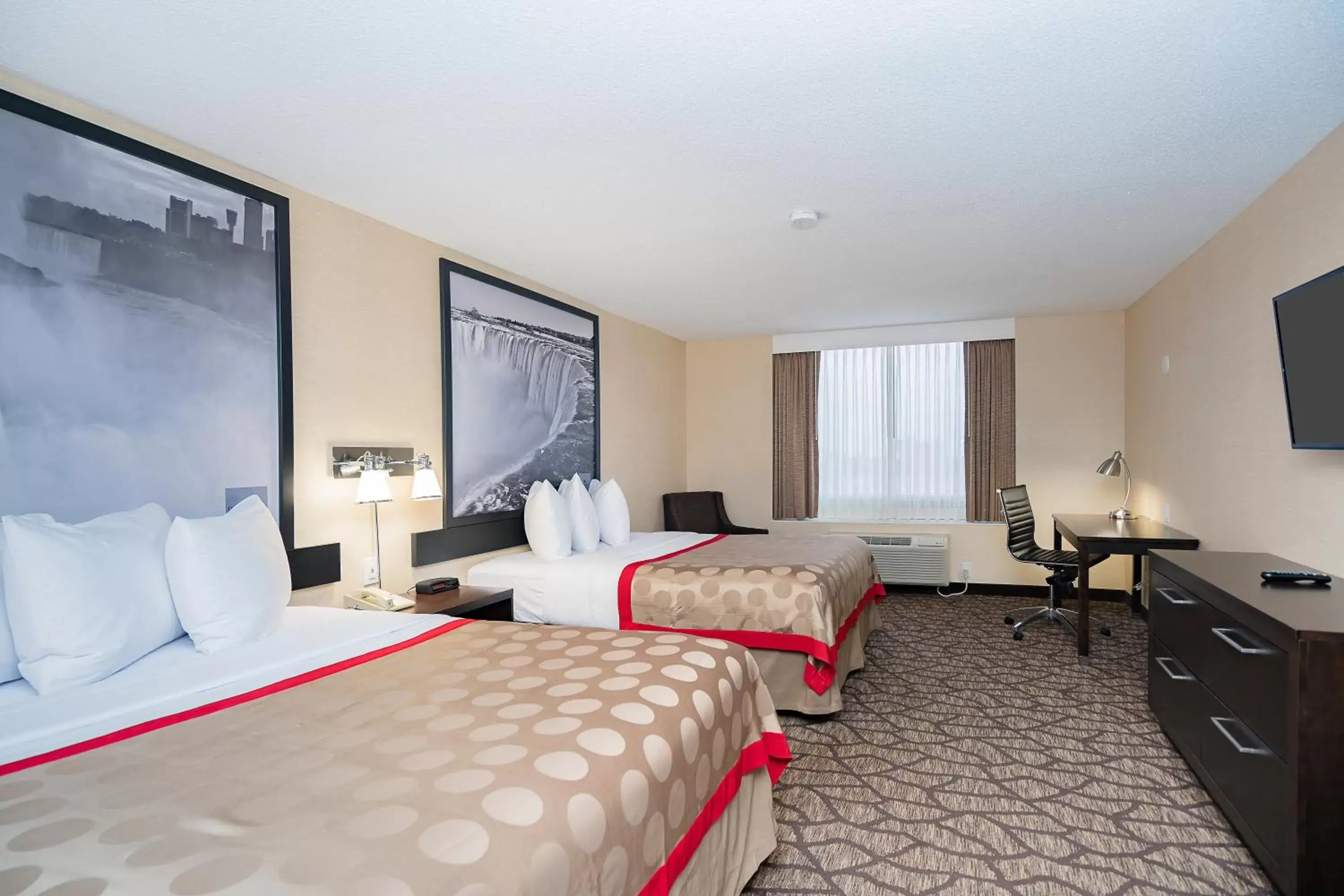 Photo of the whole room in Ramada By Wyndham Niagara Falls near the Falls