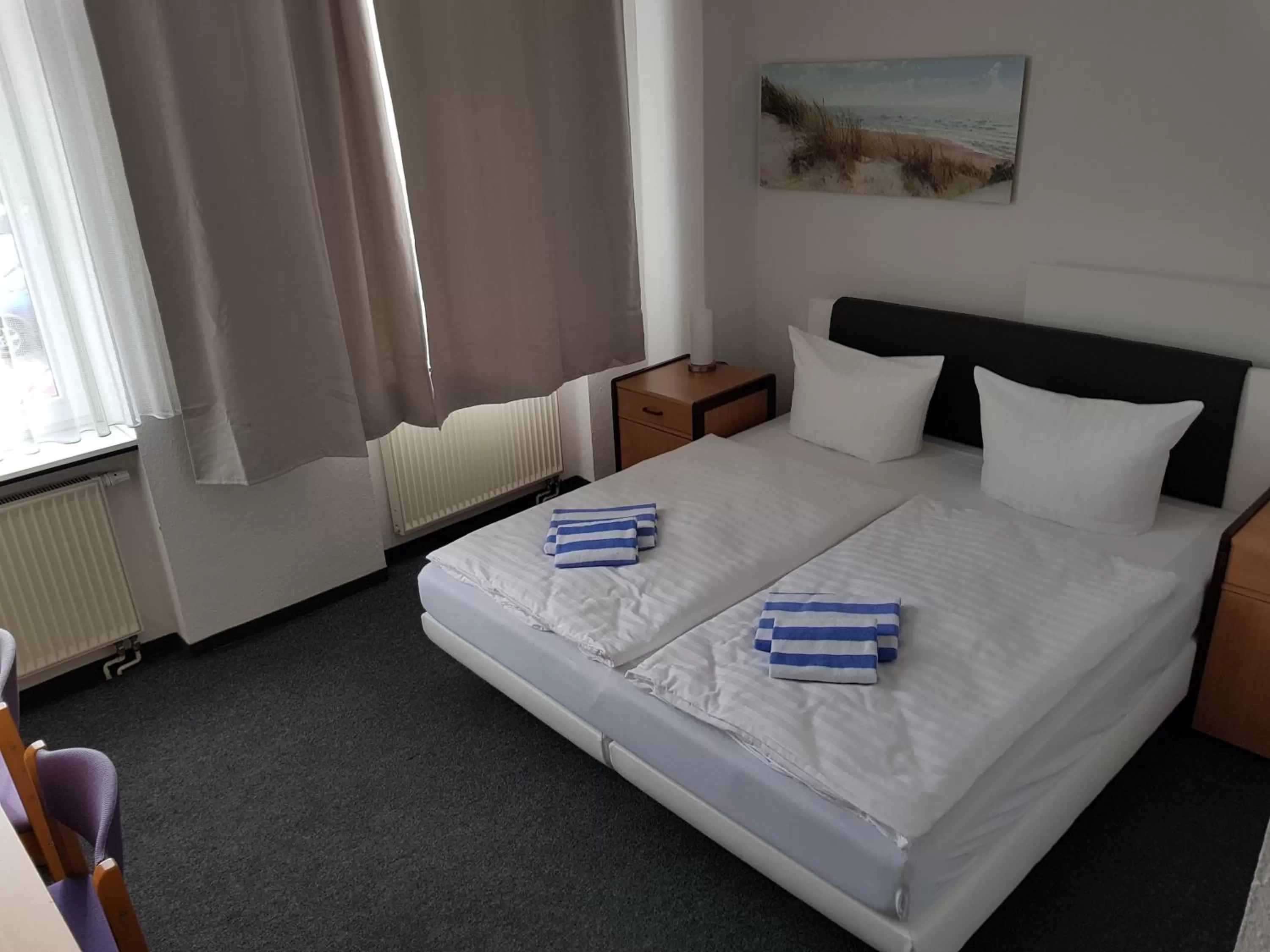 Bed in Appartement-Hotel Rostock