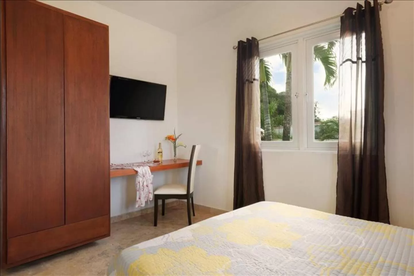 Bed in Manati World Point Inn