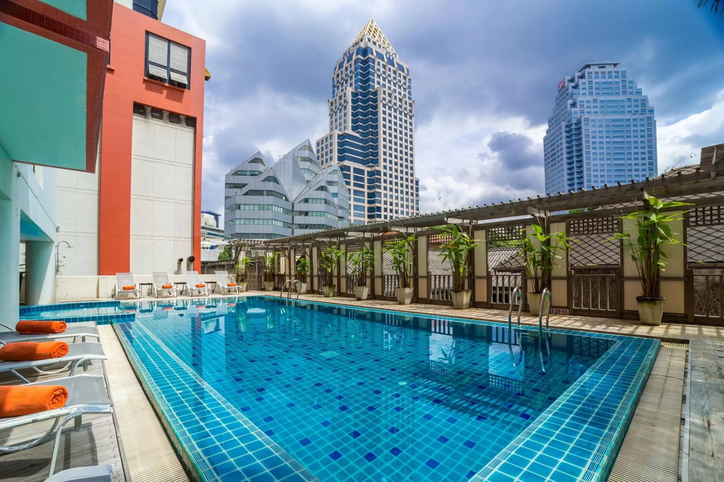 Swimming pool, Property Building in Bandara Suites Silom, Bangkok - SHA Extra Plus