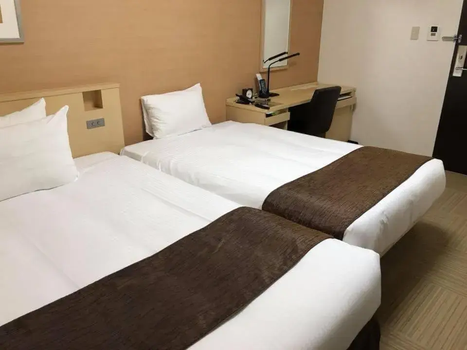 Bed in Shizutetsu Hotel Prezio Shizuoka Ekinan
