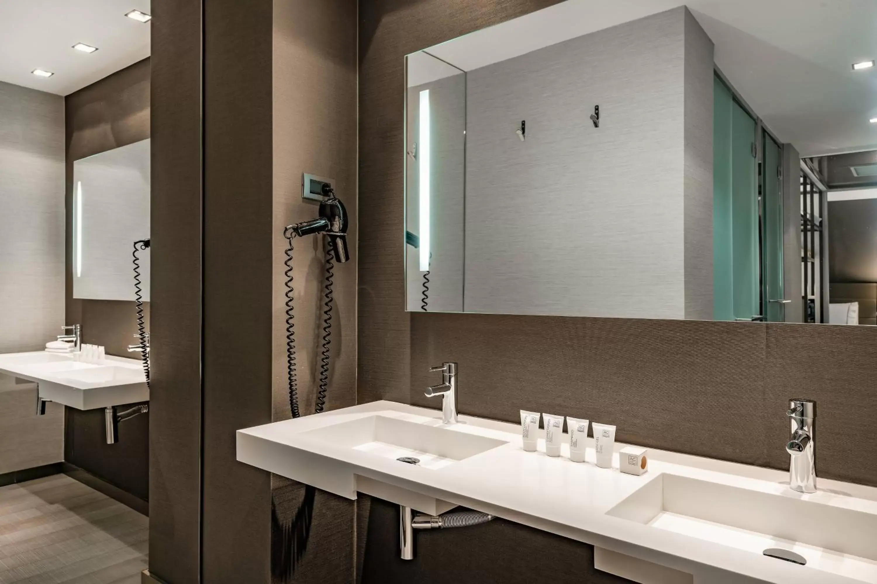 Bathroom in AC Hotel Los Vascos by Marriott