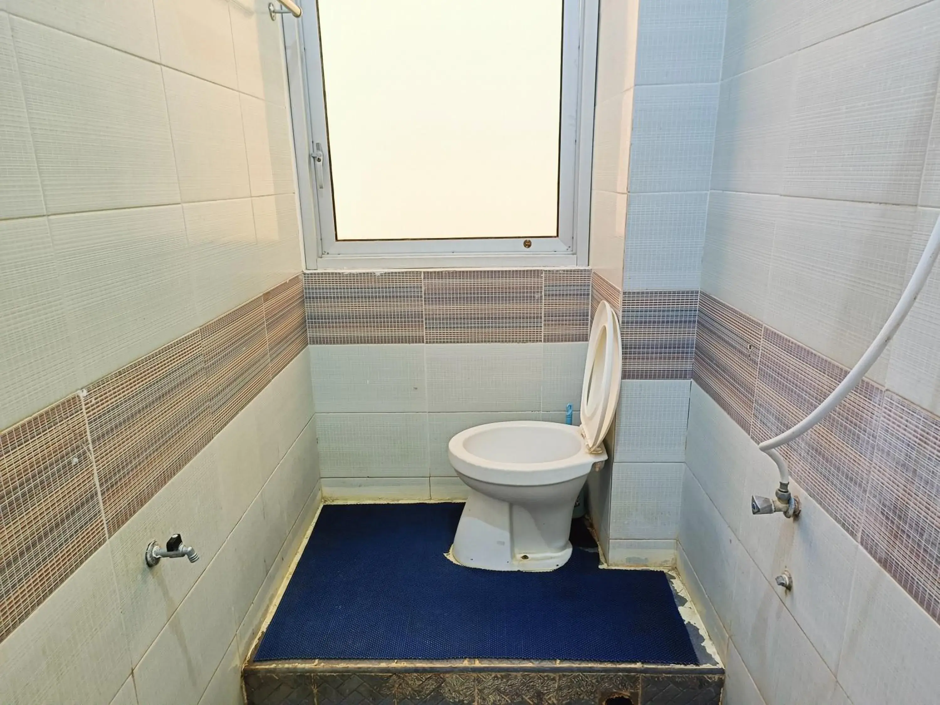 Bathroom in OYO 90260 Bumi Merpati Residence