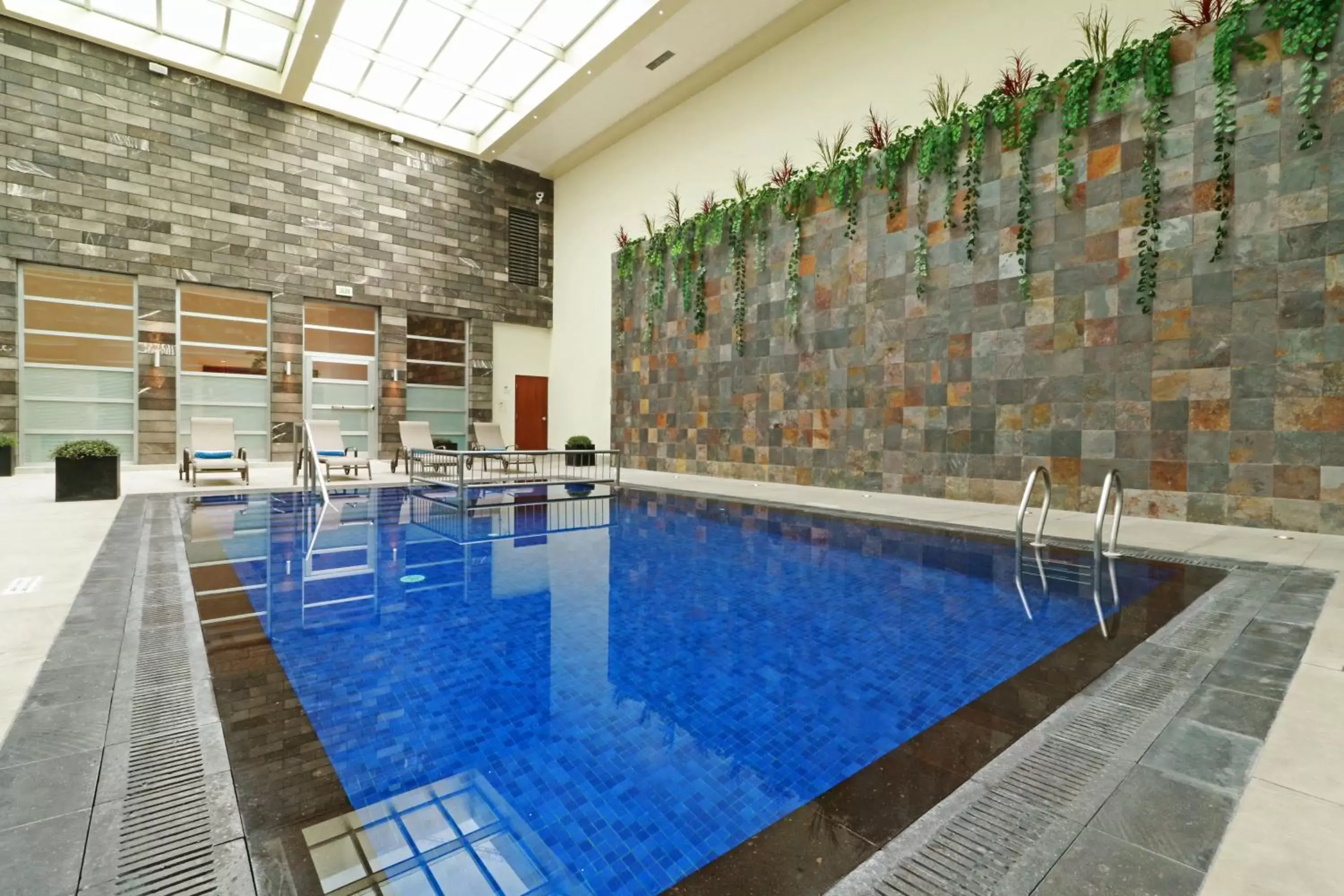 Swimming Pool in Holiday Inn & Suites Plaza Mayor, an IHG Hotel