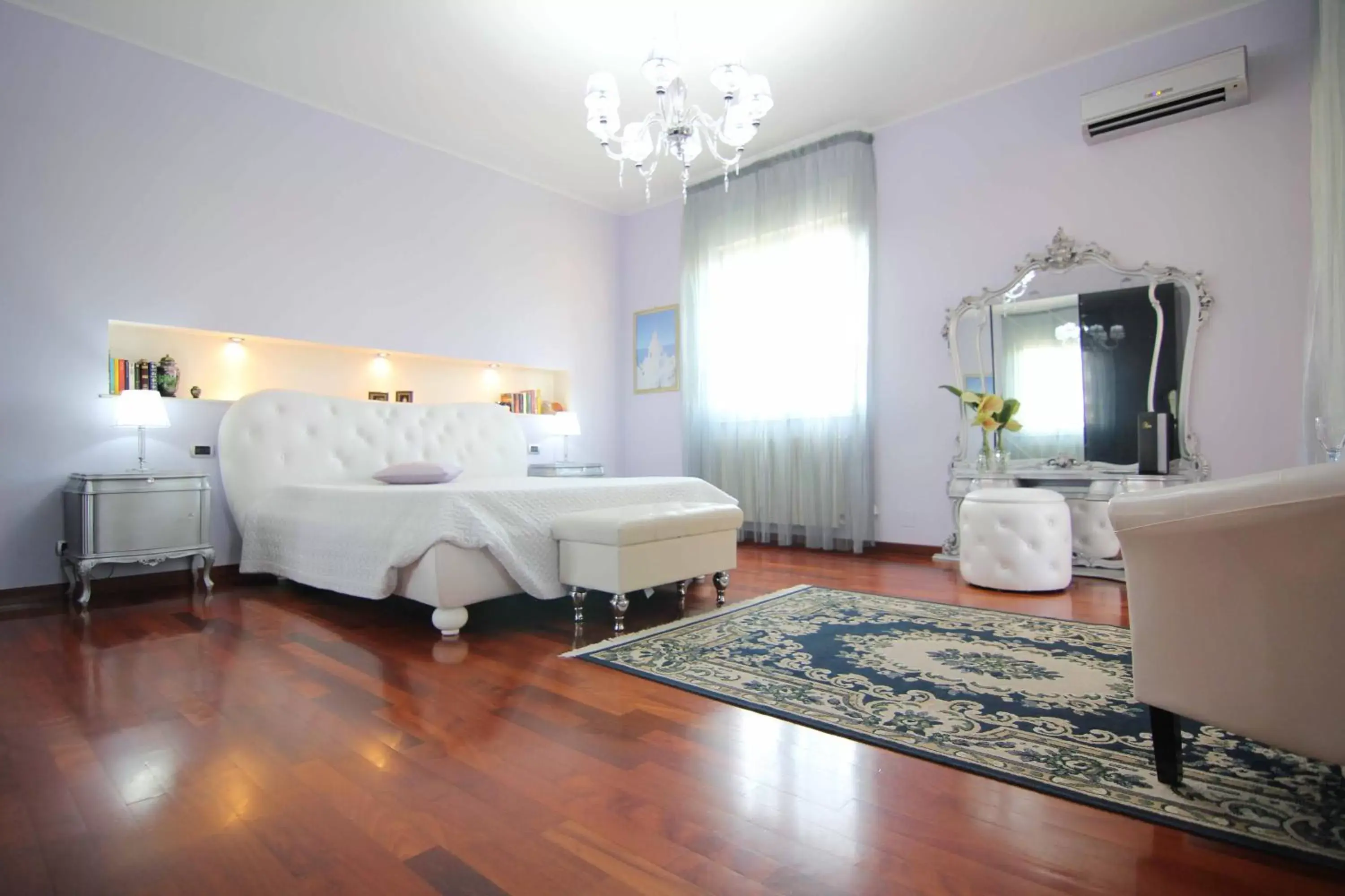 Photo of the whole room, Bed in Il Giardino delle Jacaranda