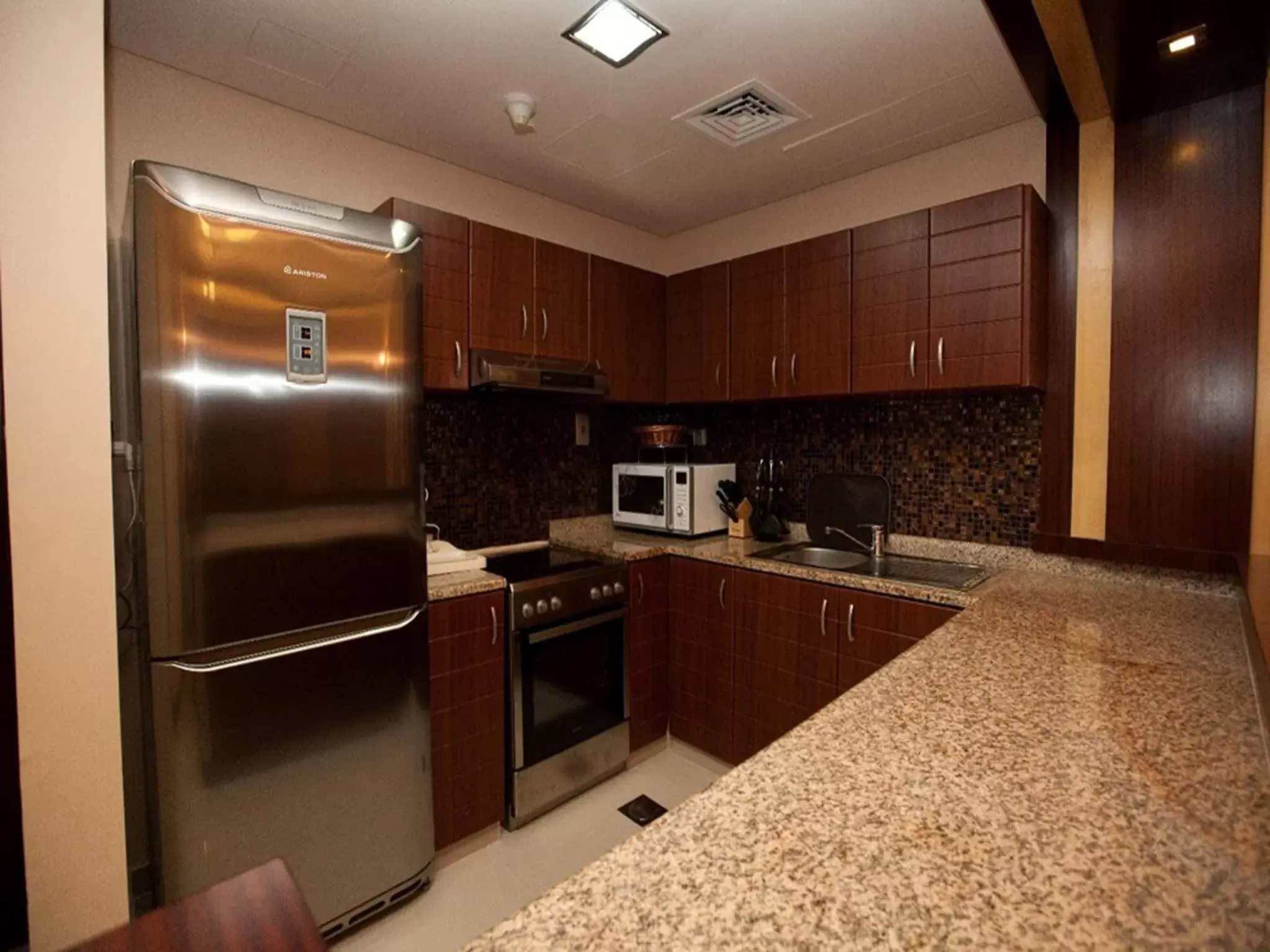 Kitchen or kitchenette in Xclusive Maples Hotel Apartment Kitchen or kitchenette in Xclusive Maples Hotel Apartment