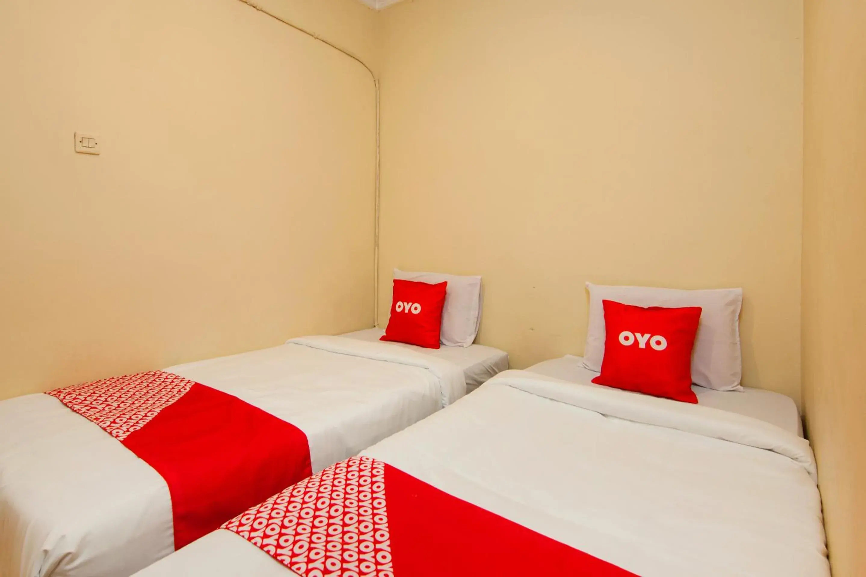 Bedroom, Bed in OYO 2045 Hotel 211