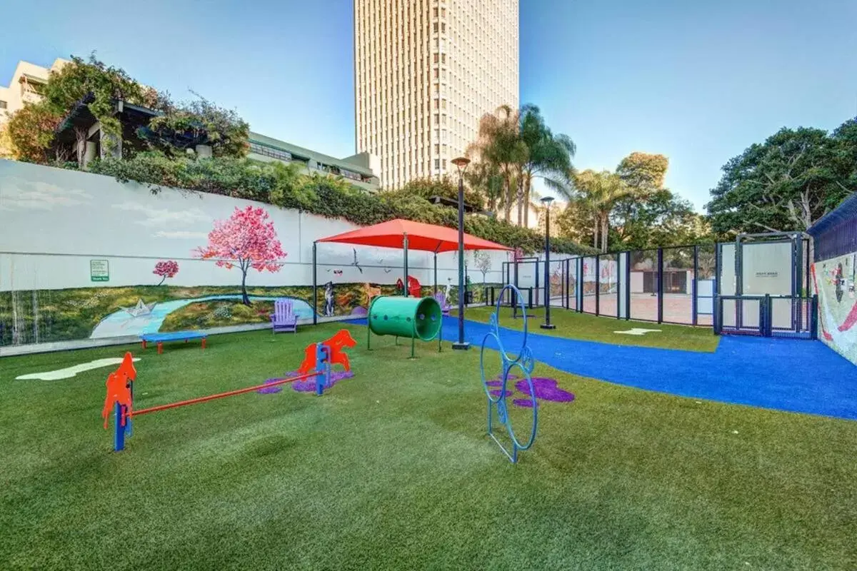 Children play ground, Children's Play Area in Amazing DTLA View 1bd Full Kitchen Free Private Parking.