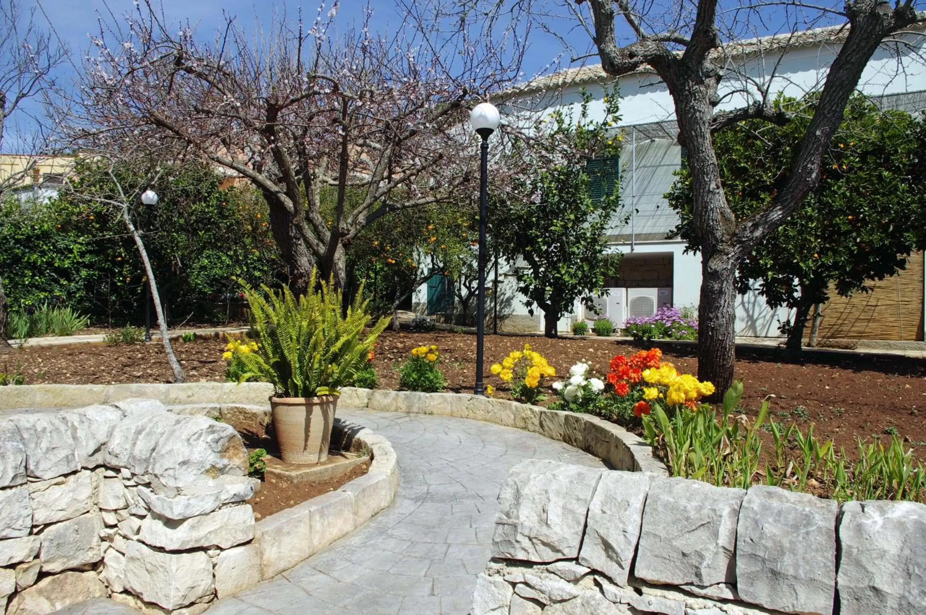 Garden view, Property Building in La Piccola Locanda