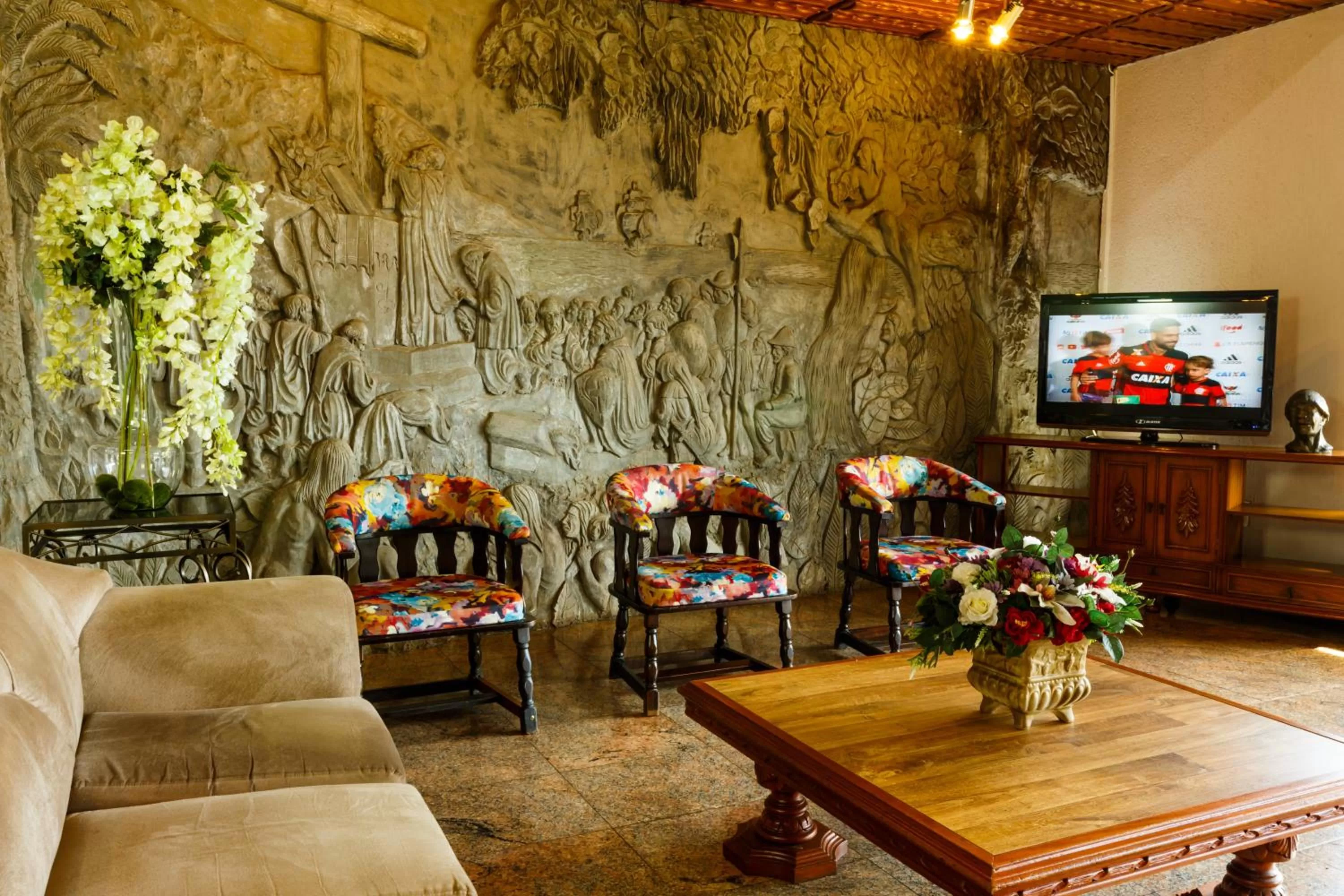 Communal lounge/ TV room in Rede Andrade Mirante