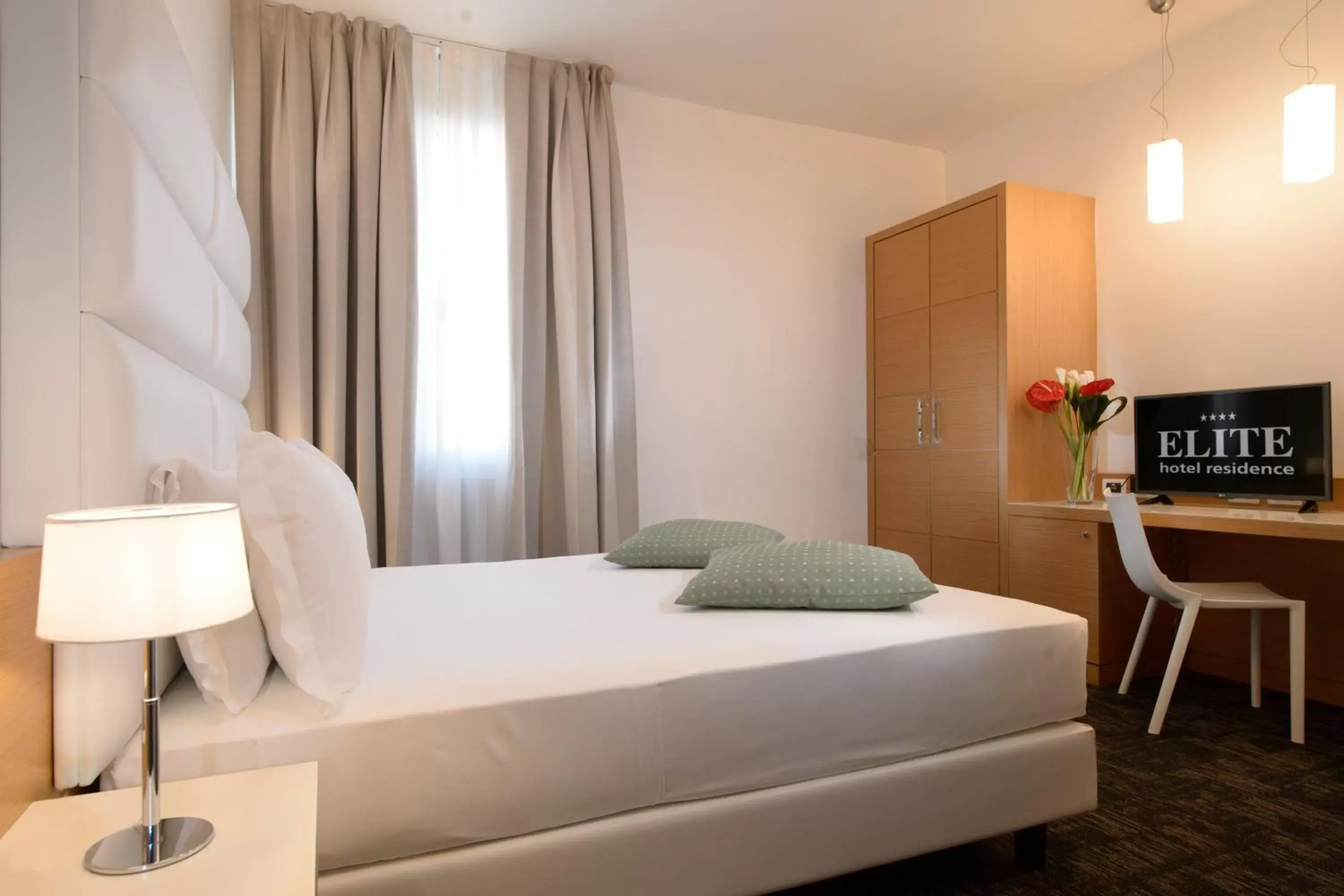 Bed in Elite Hotel & Spa