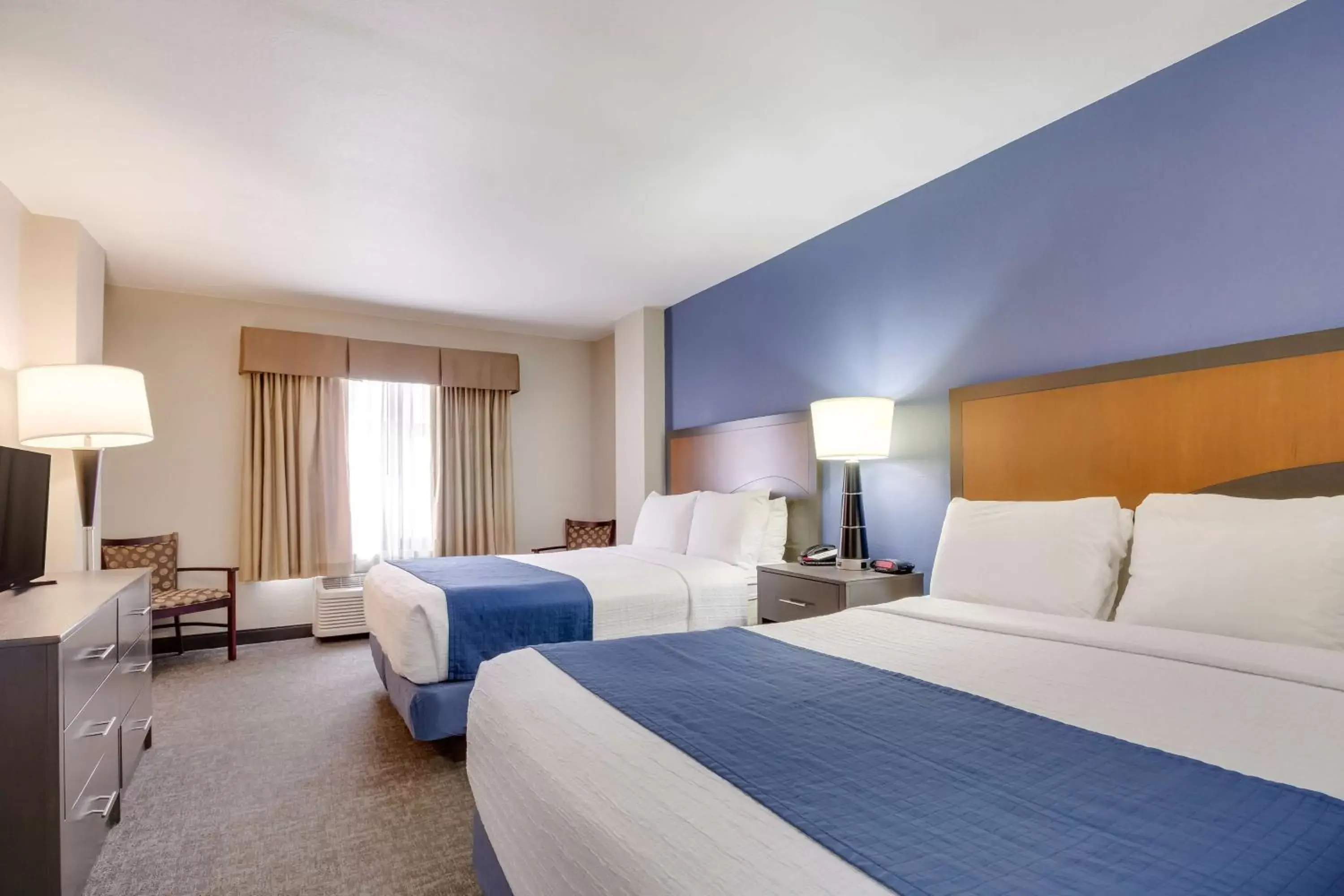 Photo of the whole room, Bed in SureStay Plus Hotel by Best Western Houston Medical Center