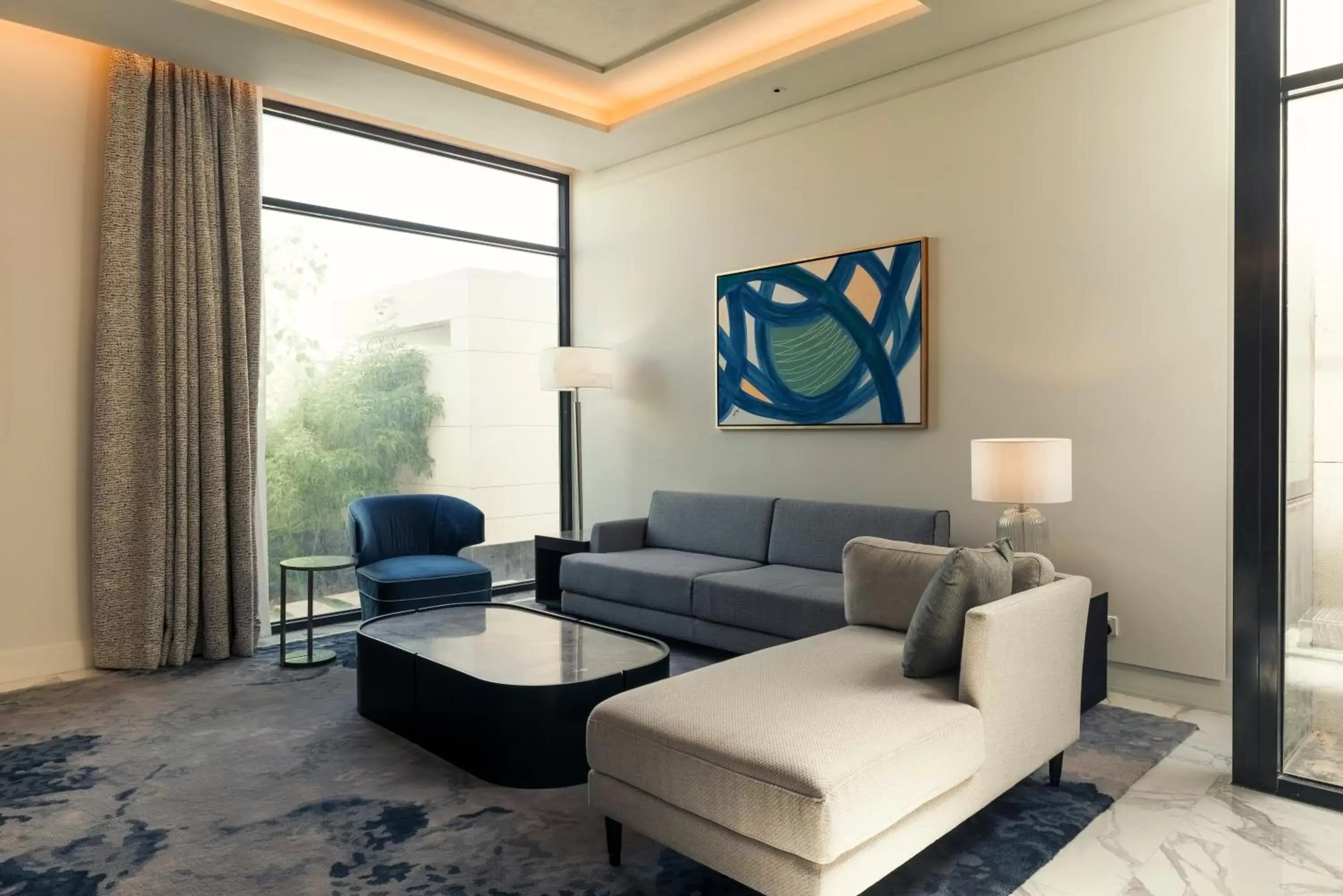 Living room, Seating Area in Mansard Riyadh, a Radisson Collection Hotel