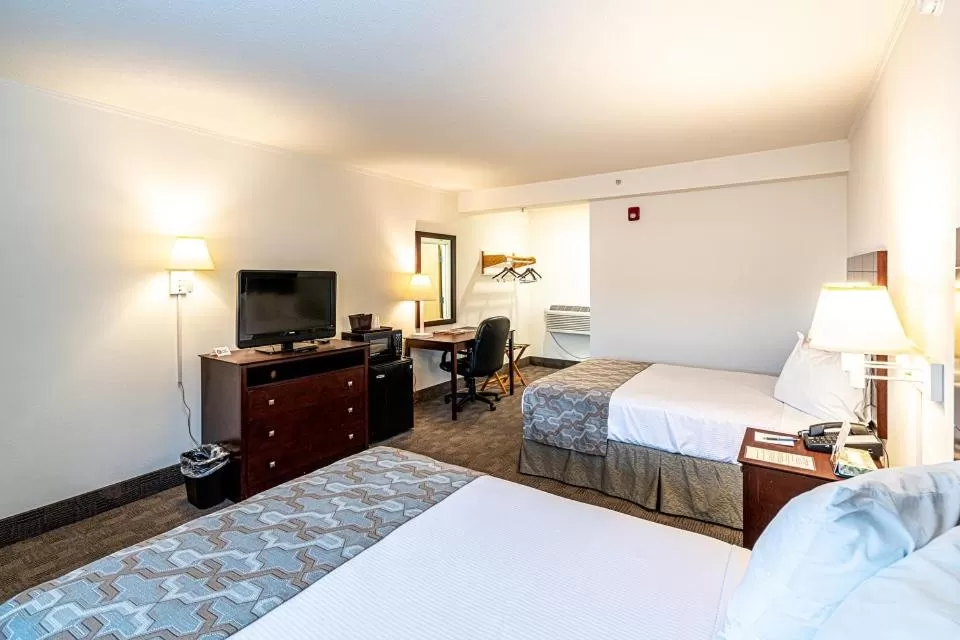 Bed in Anchorage Motel Inc.