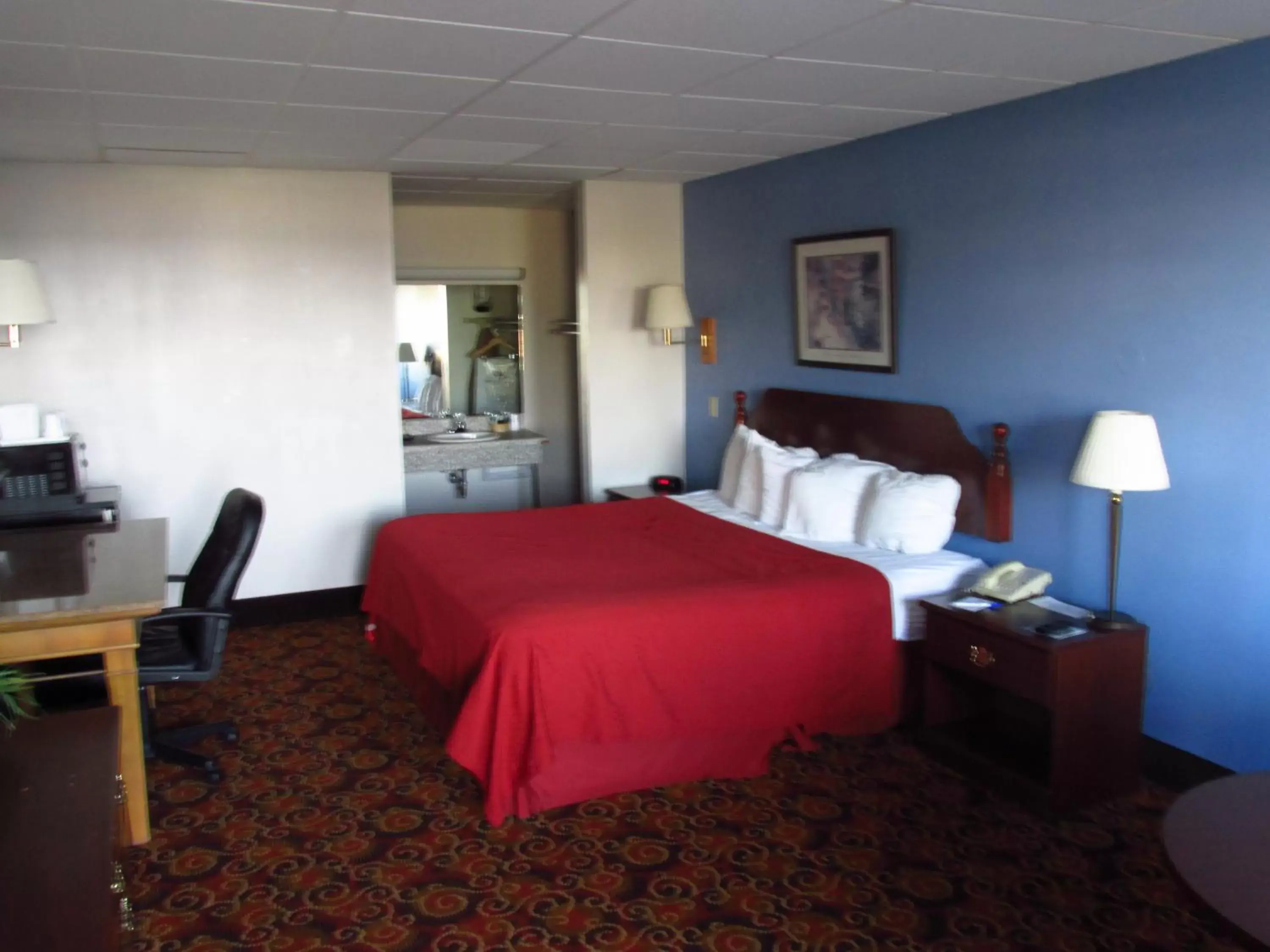 Bed in Americas Best Value Inn-Celina