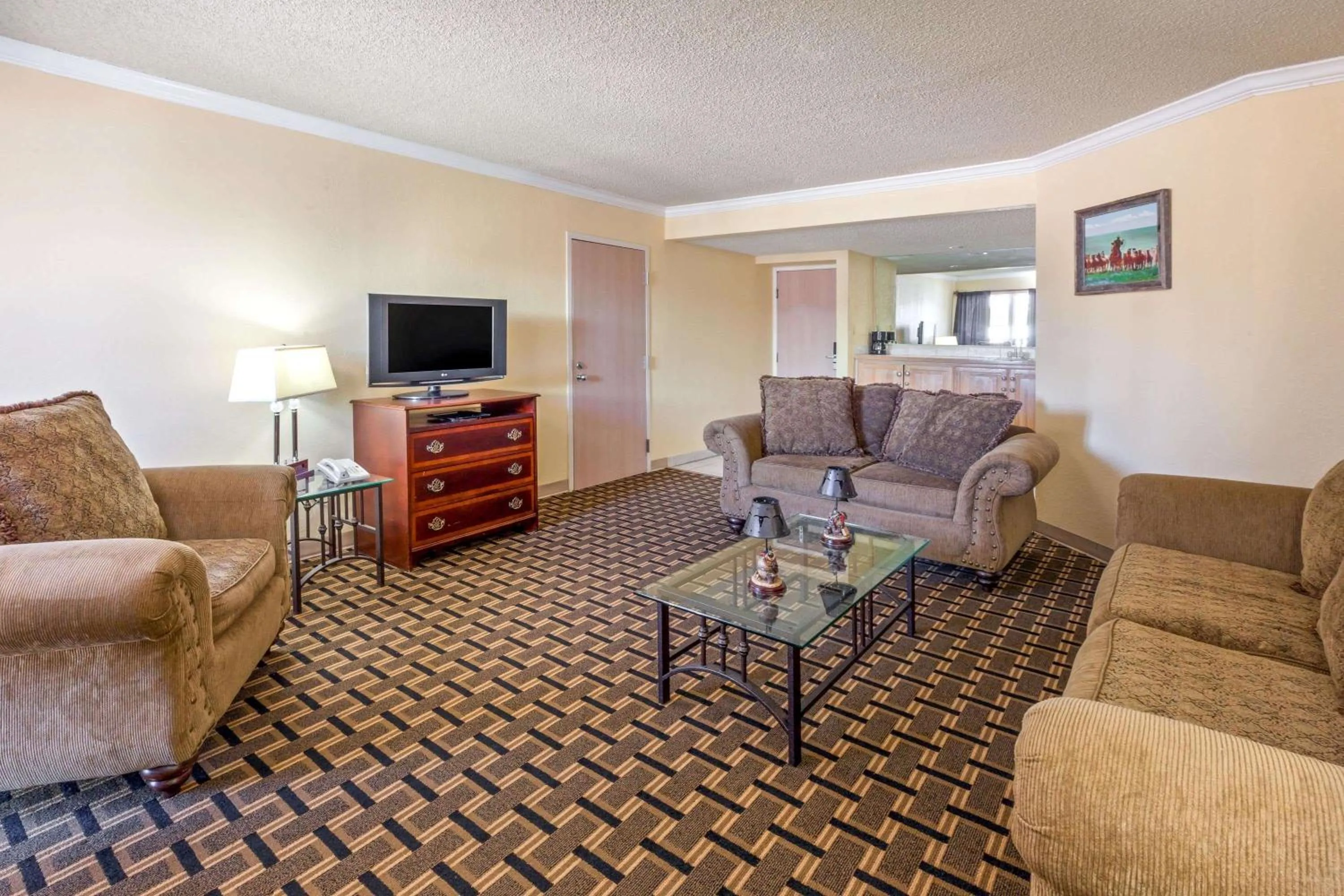 Photo of the whole room in Extend-a-Suites - Extended Stay, I-40 Amarillo West