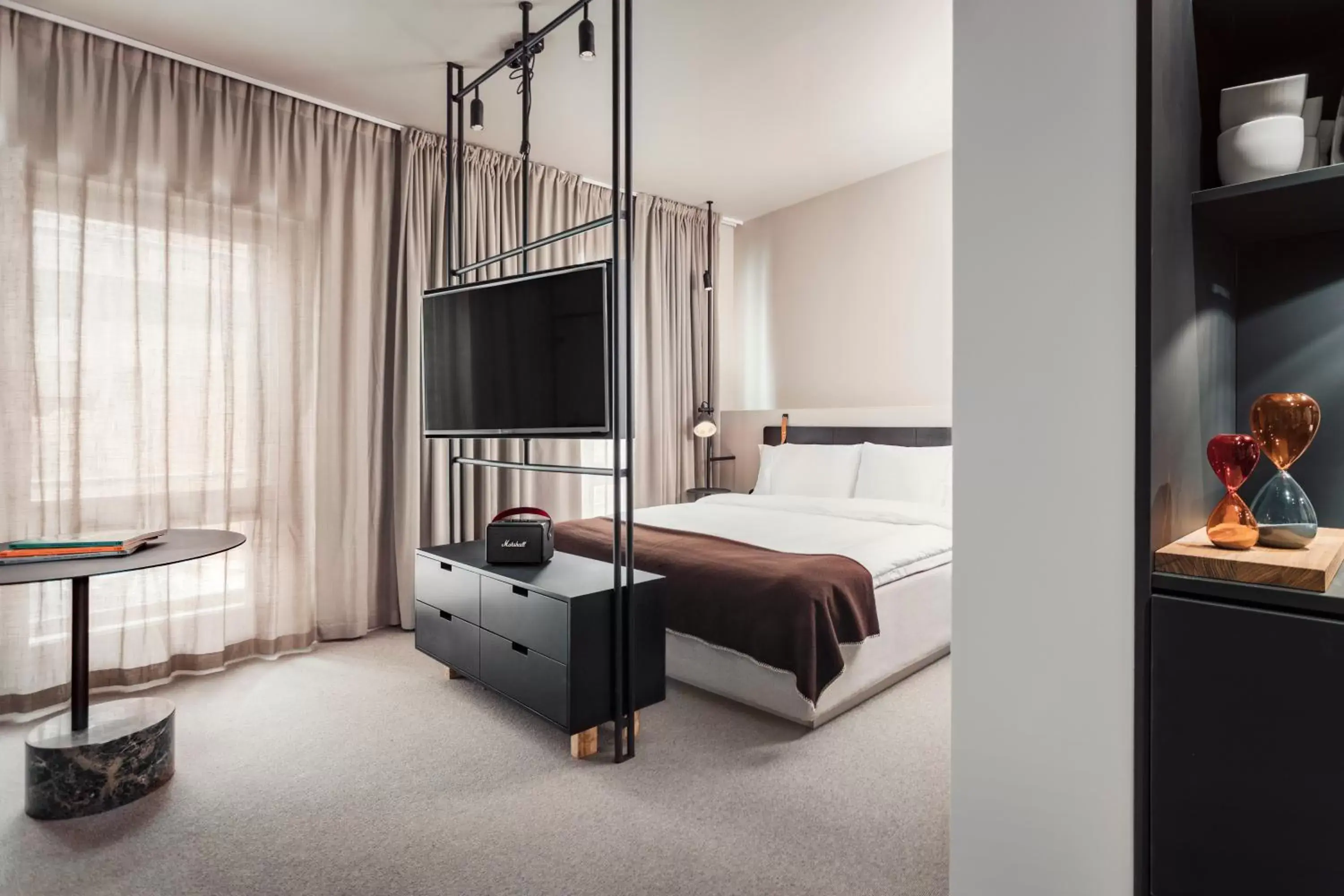 Bedroom, TV/Entertainment Center in Blique by Nobis, Stockholm, a Member of Design Hotels™