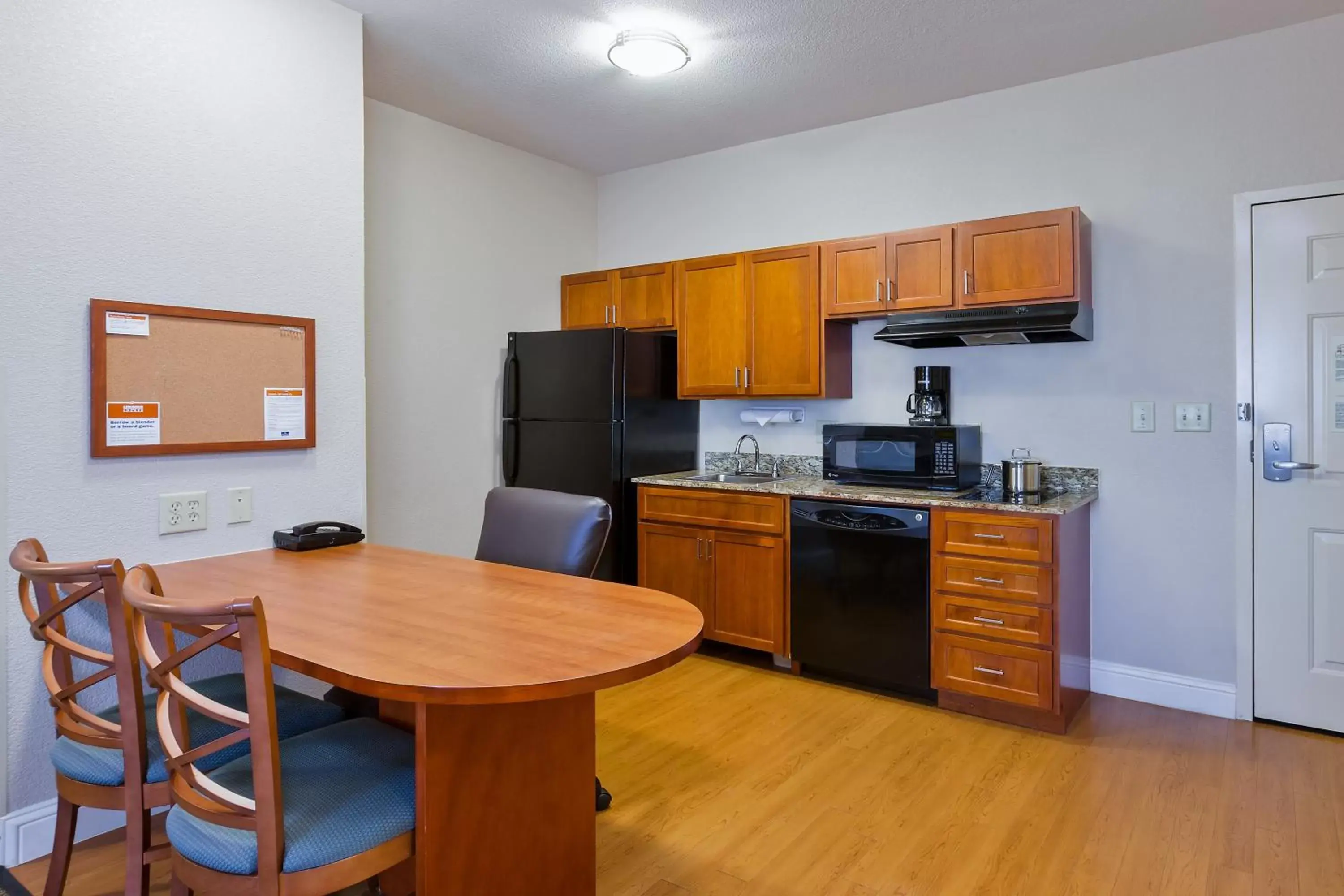 Photo of the whole room, Kitchen/Kitchenette in Candlewood Suites Decatur Medical Center, an IHG Hotel