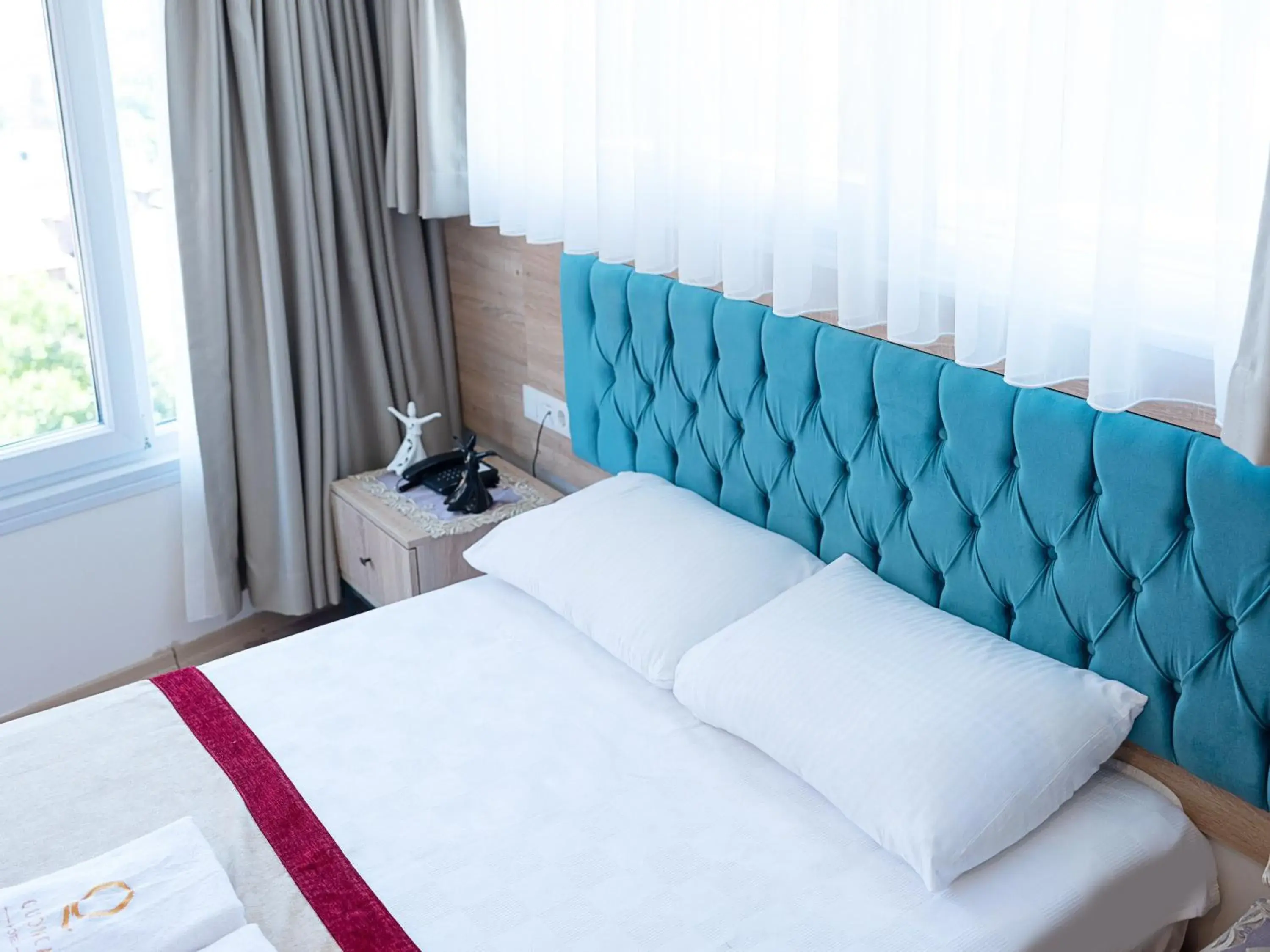 Bed in THE LAİLA HOTEL
