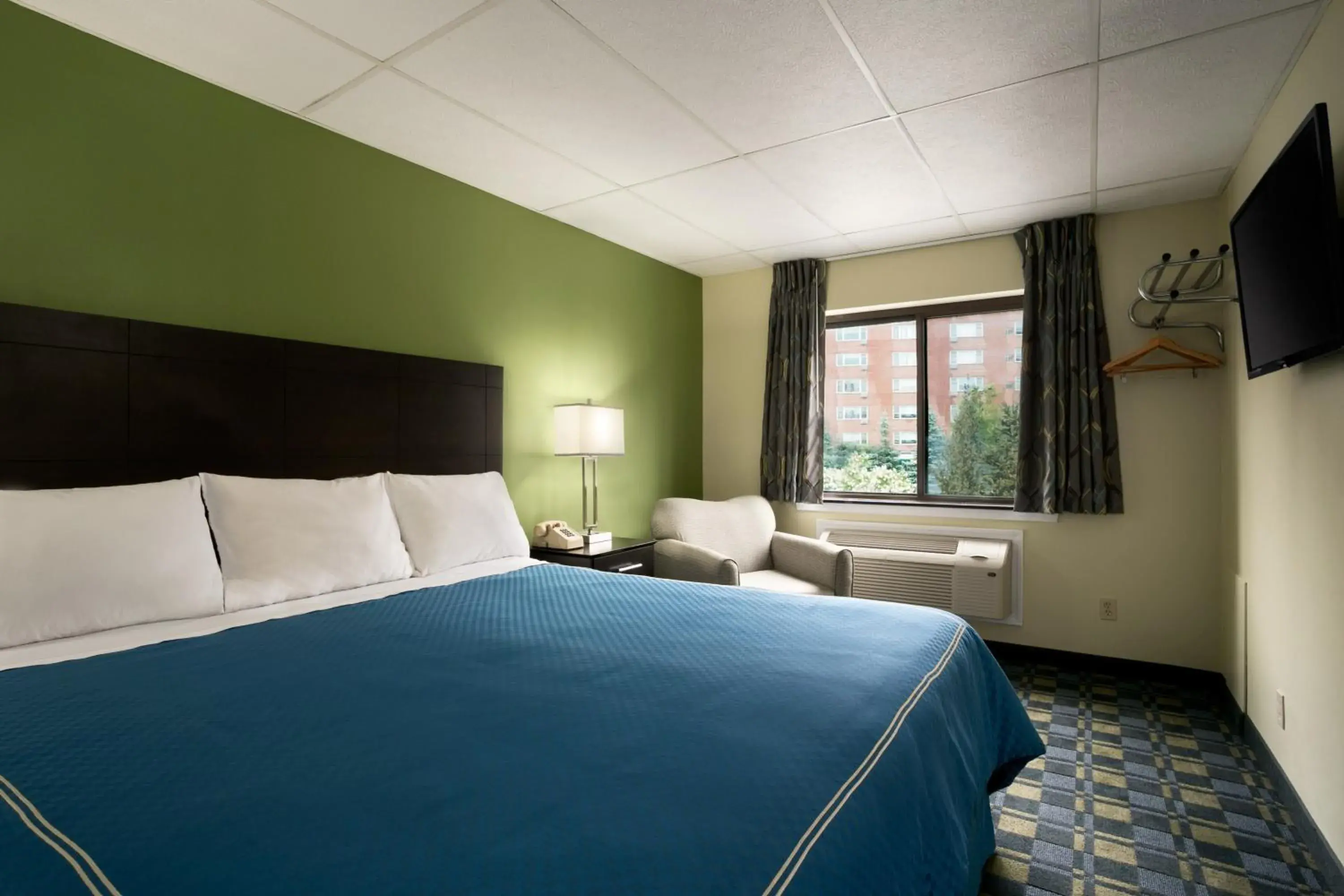 Day, Bed in Travelodge by Wyndham Cleveland Lakewood