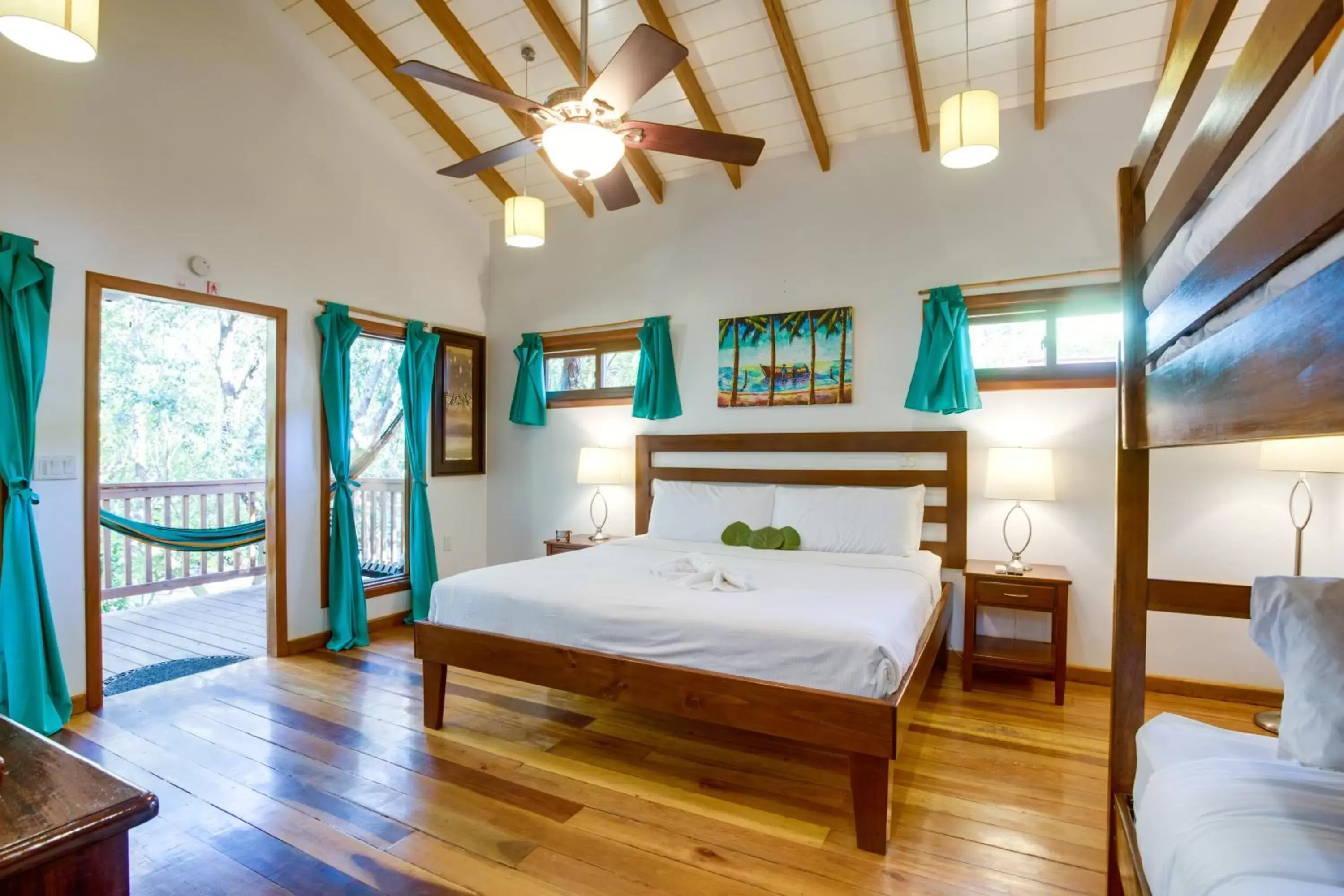 Bed in Mariposa Belize Beach Resort