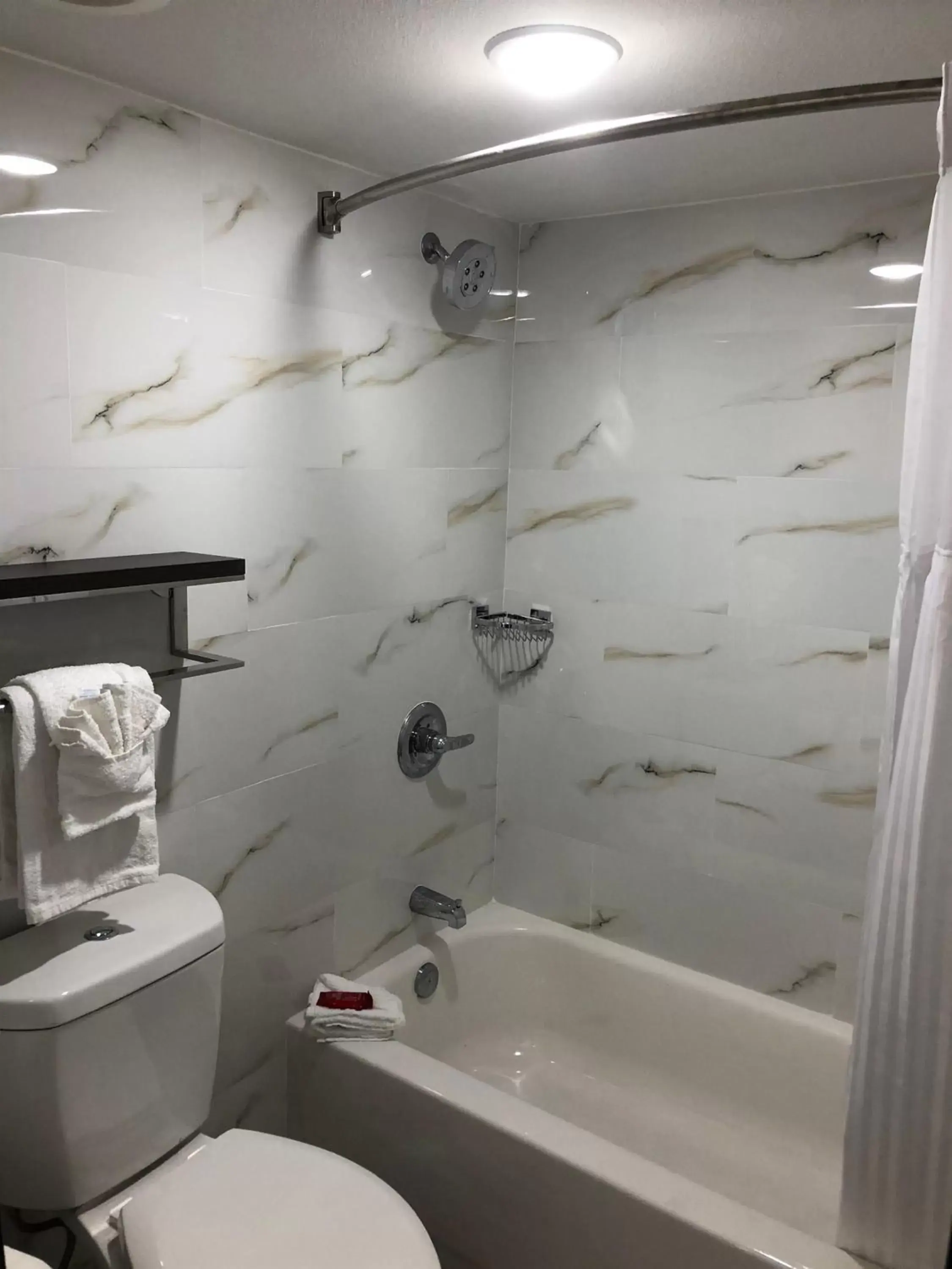 Bathroom in SureStay Plus Hotel by Best Western Sacramento Cal Expo