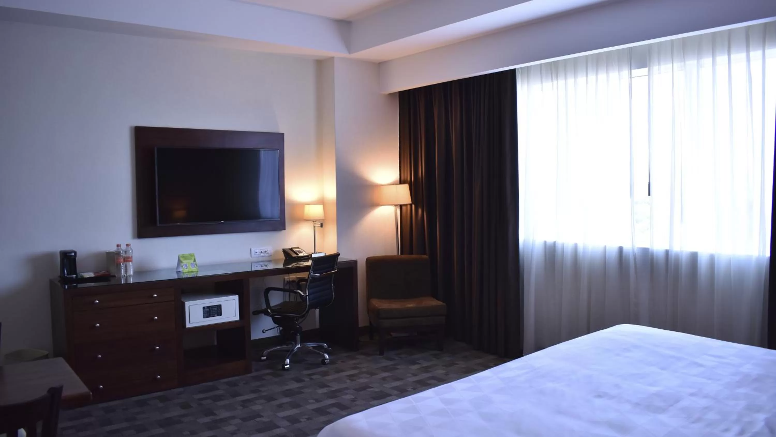 Bed in Holiday Inn & Suites Plaza Mayor by IHG