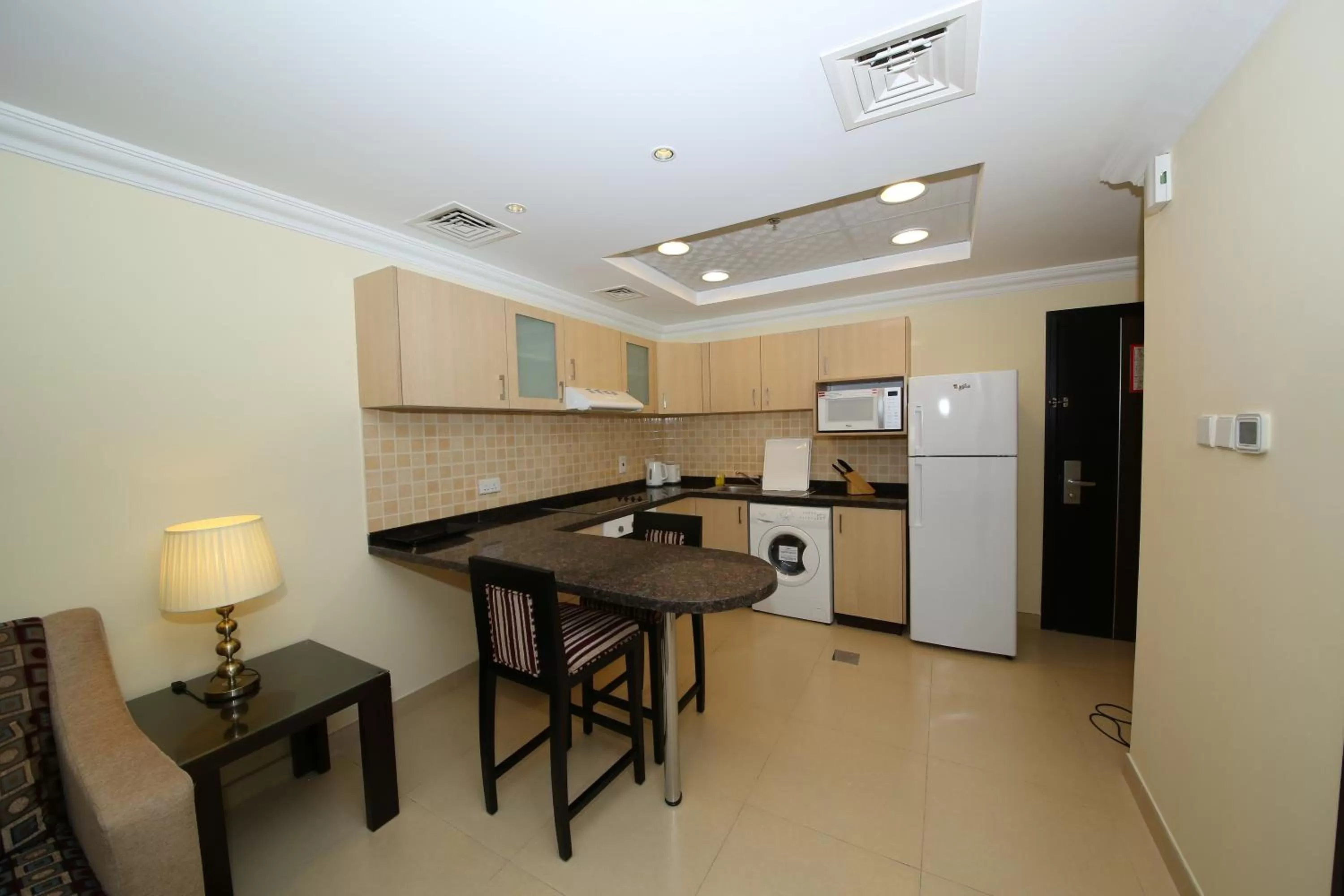 Kitchen or kitchenette in Ivory Grand Hotel Apartments