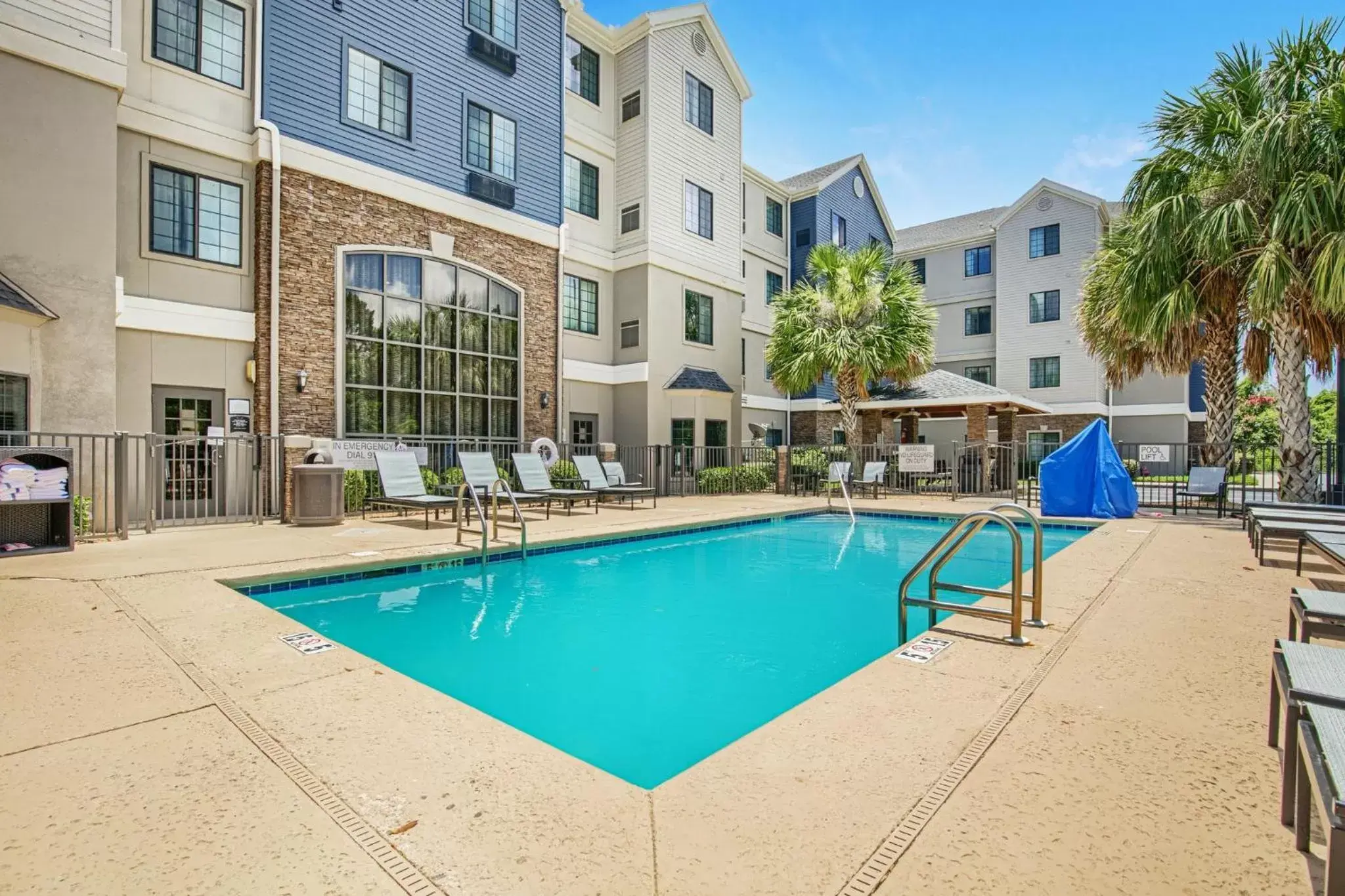 Swimming pool, Property Building in Staybridge Suites Gulf Shores, an IHG Hotel