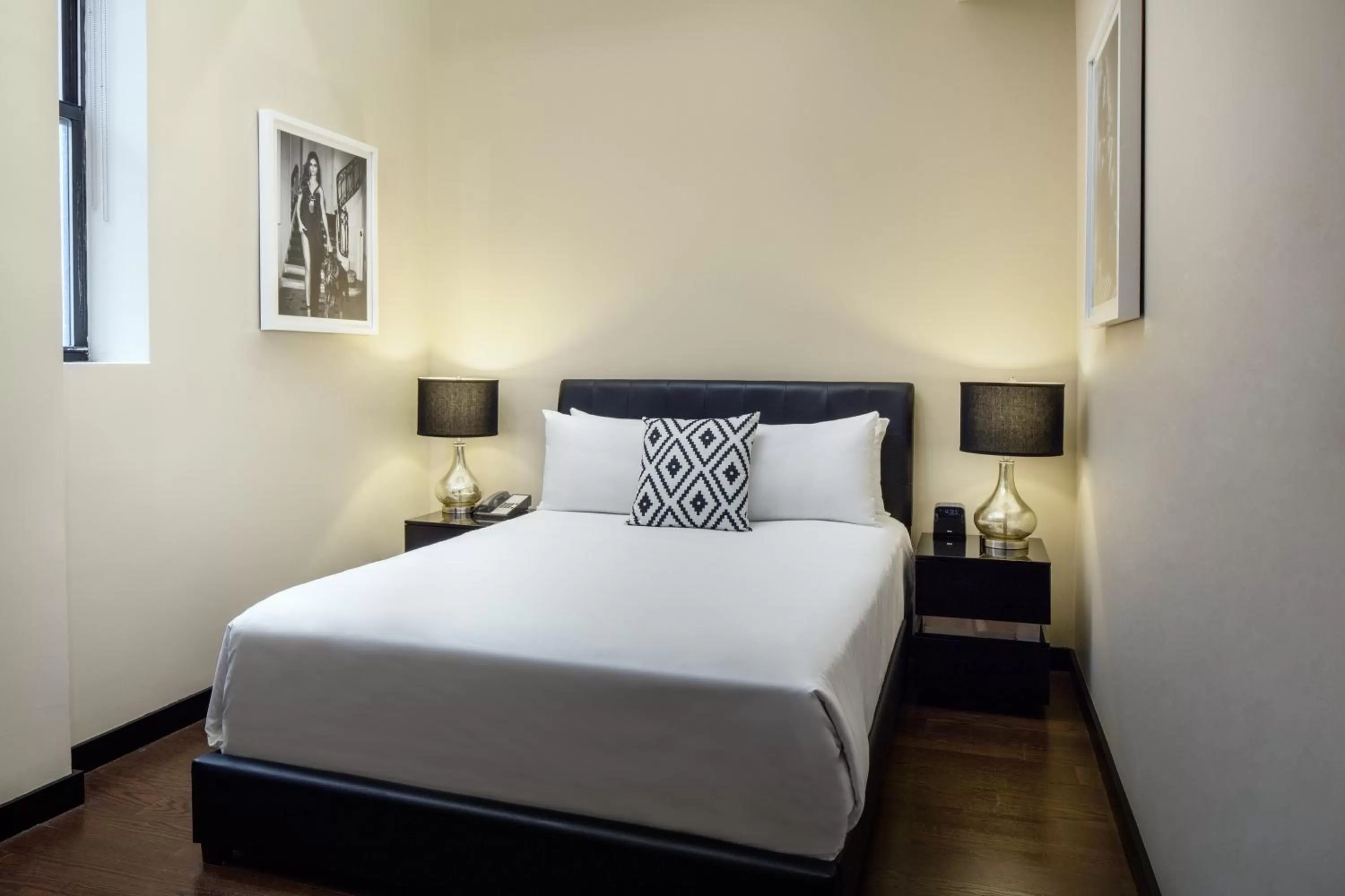 Bed in Cachet Boutique Hotel NYC