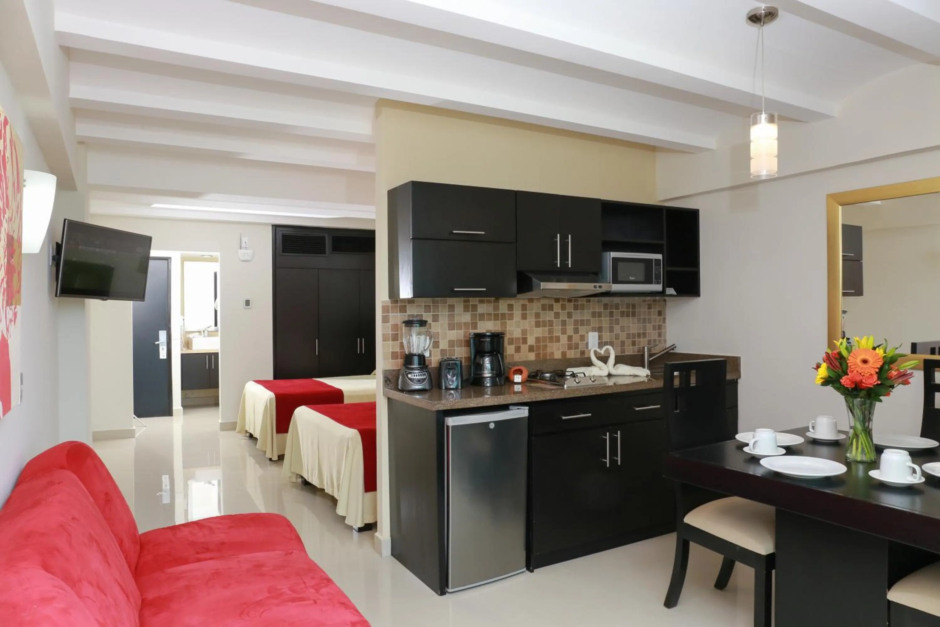 Kitchen or kitchenette in Las Flores Beach Resort