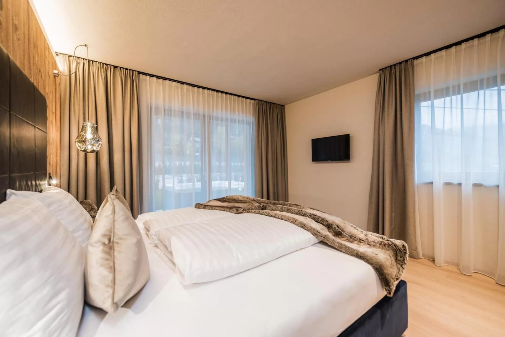 Bedroom, Bed in K1 Mountain Chalet - Luxury Apartements