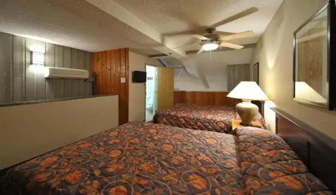 Bed in Douglas Fir Resort & Chalets