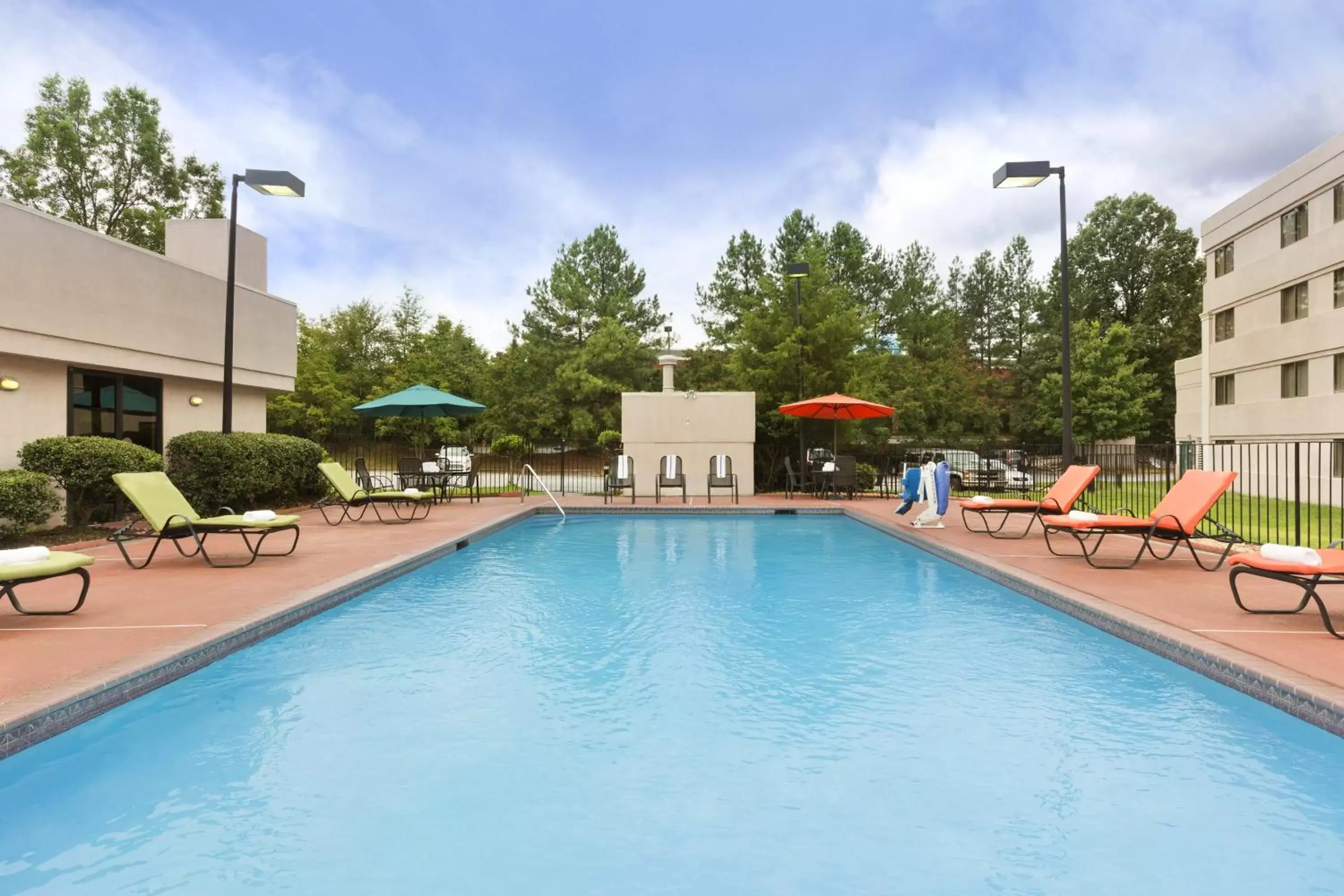 Swimming pool in Country Inn & Suites by Radisson, Atlanta Airport South, GA