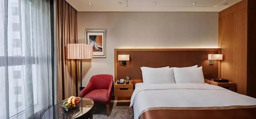 Bed in Millennium Hotel Taichung