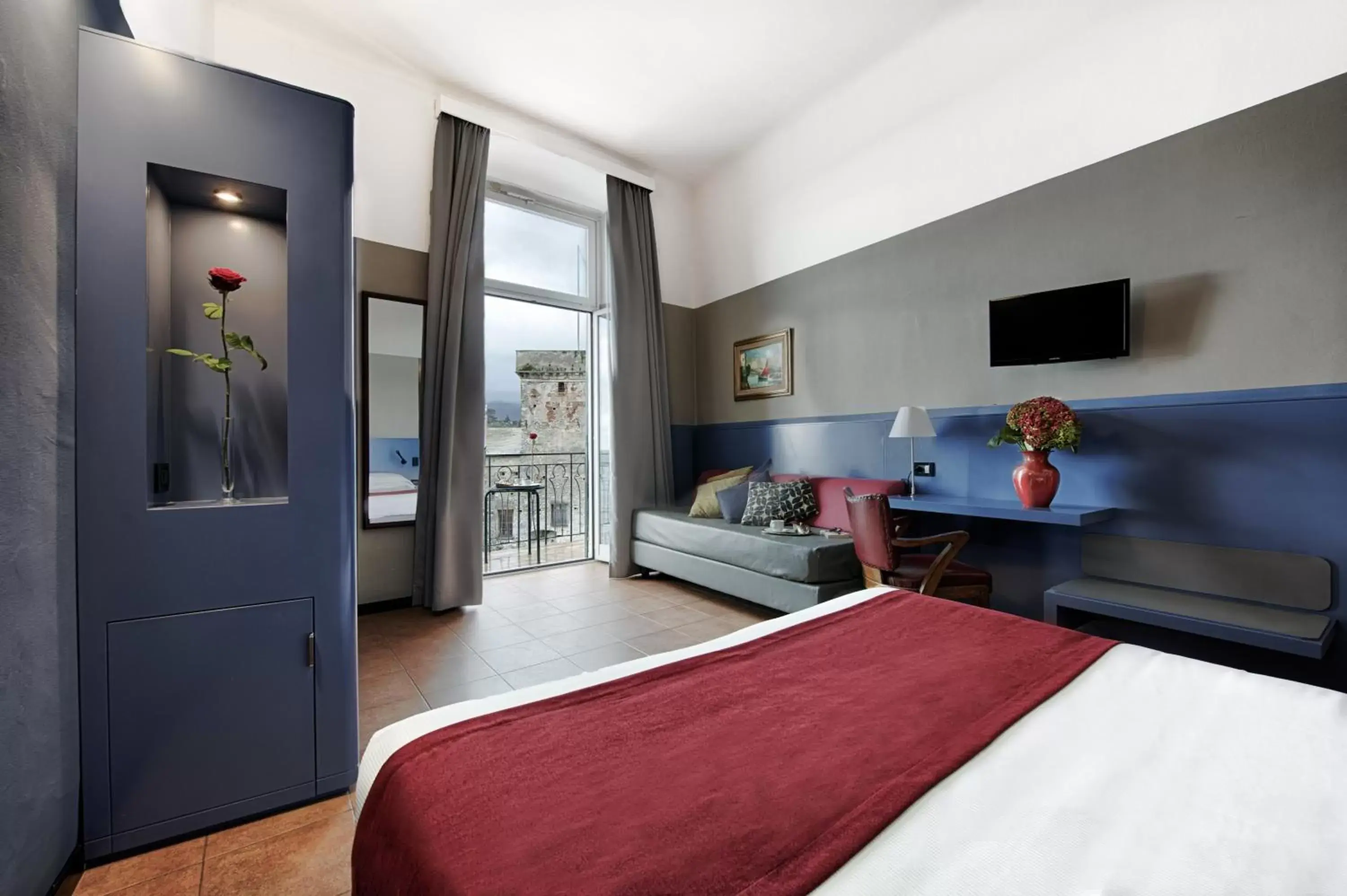 Bedroom, TV/Entertainment Center in Hotel Italia e Lido Rapallo