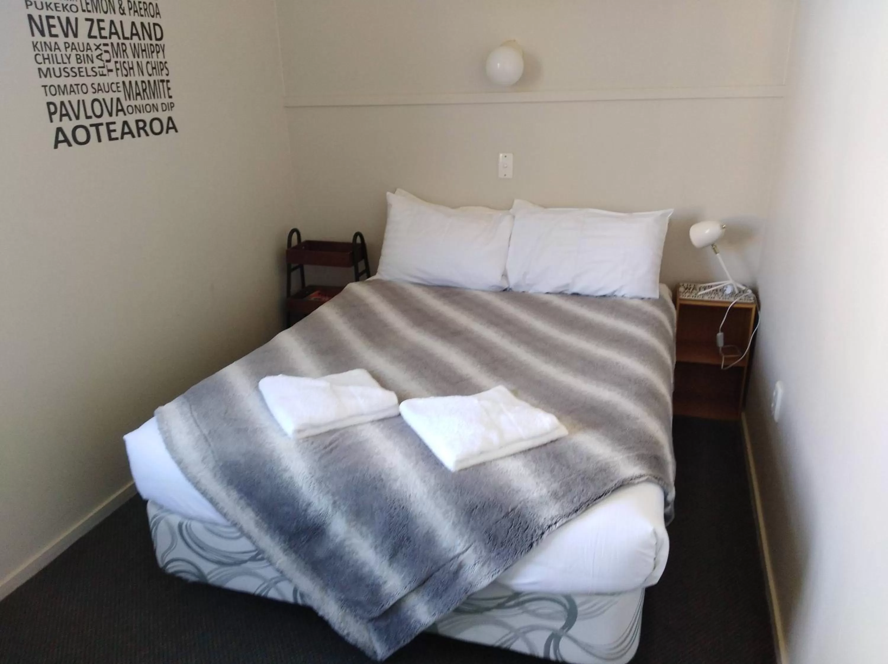Bed in Hokitika Pioneer Hotel
